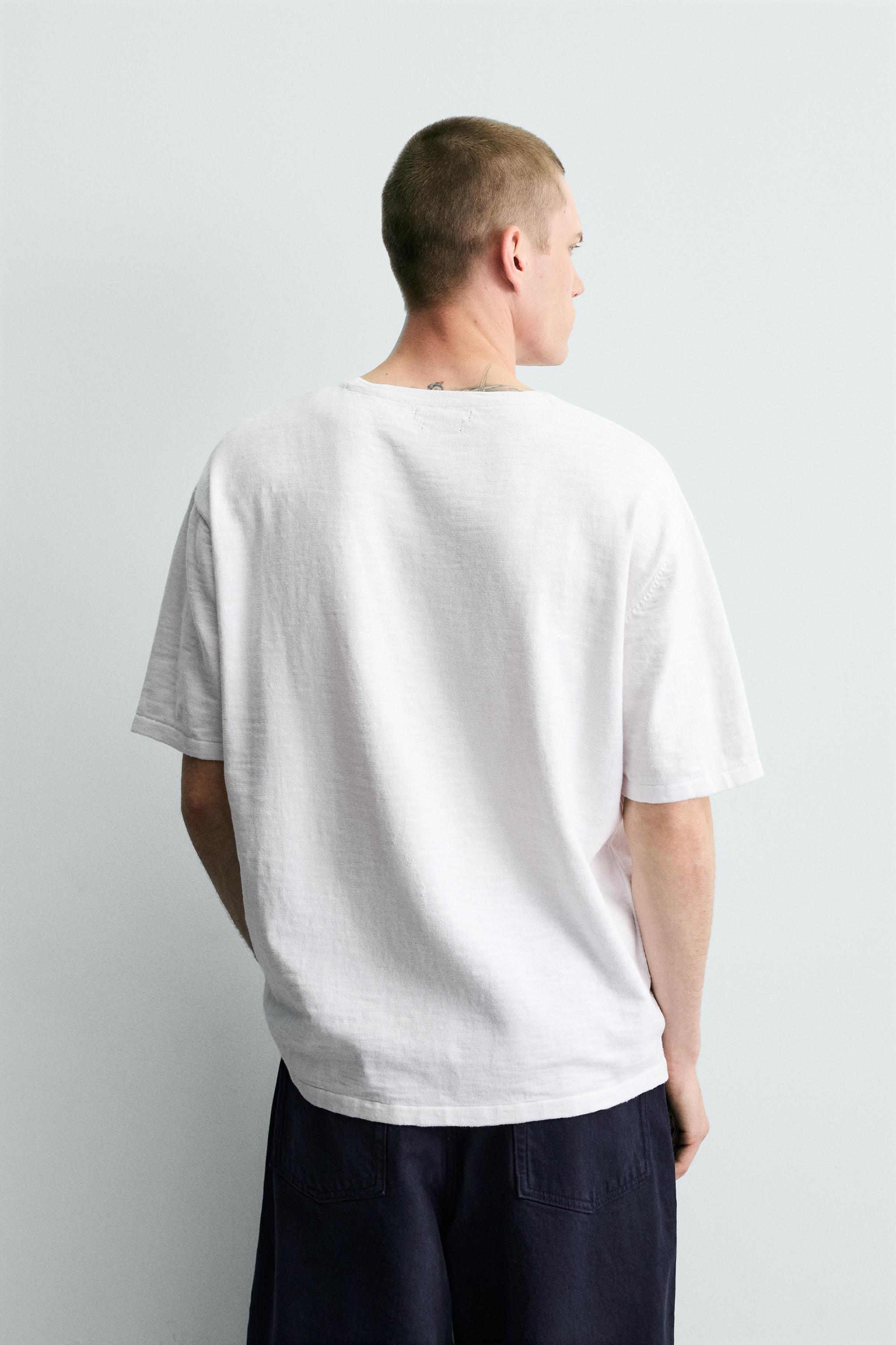 T-SHIRT EN MAILLE STRUCTURÉE FLAMMÉE