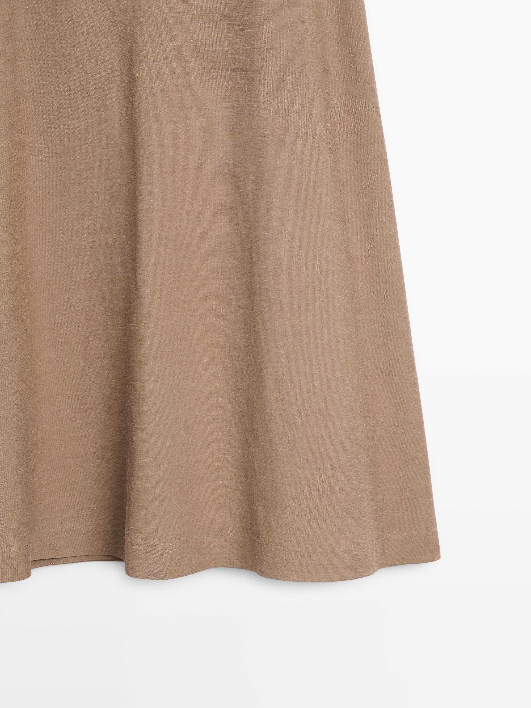 Jupe midi évasée à taille élastique