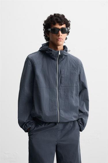 BLOUSON TECHNIQUE À CAPUCHE - Indigo clair de Zara - Image 1