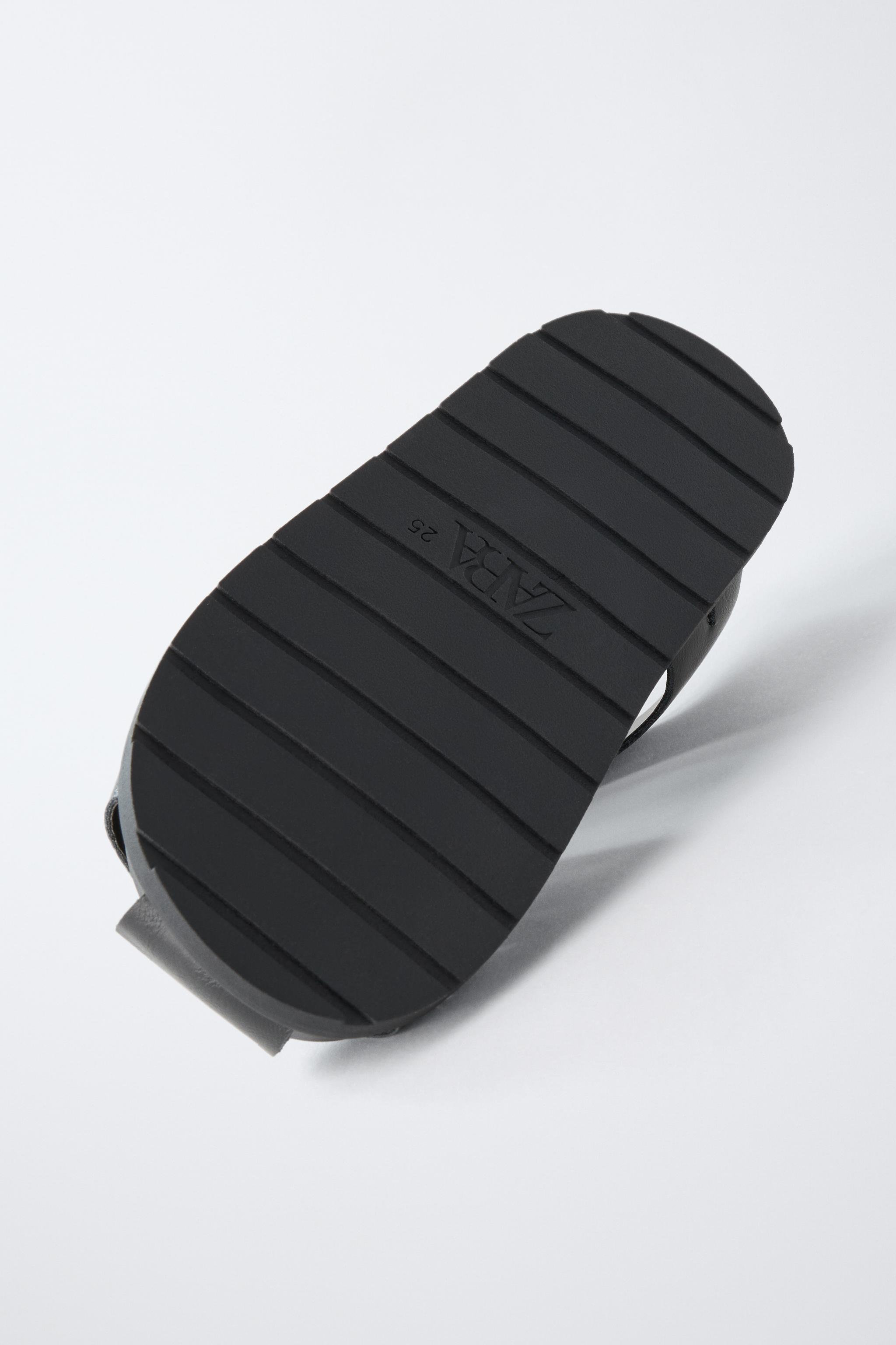 STRAPPY FISHERMAN SANDALS