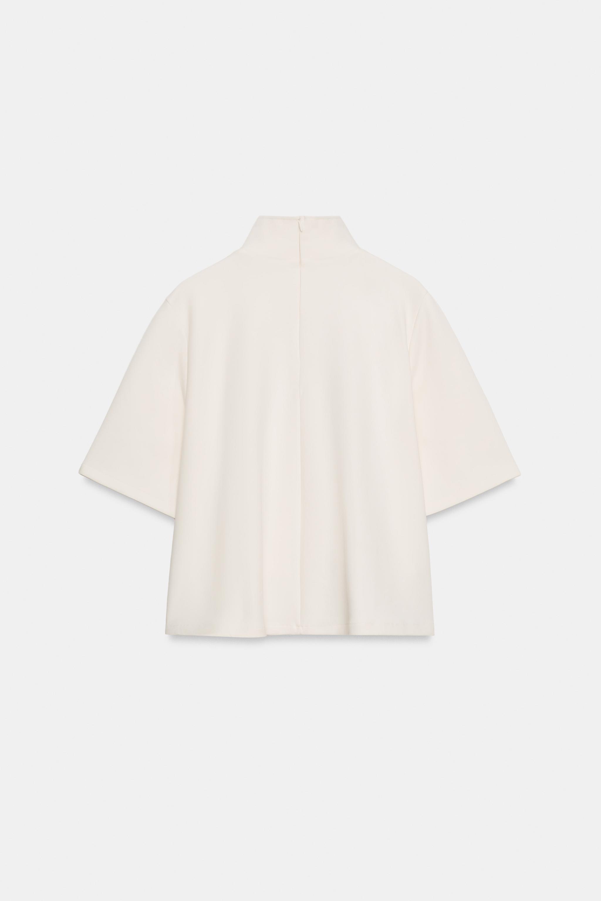INTERLOCK HIGH-NECK TOP