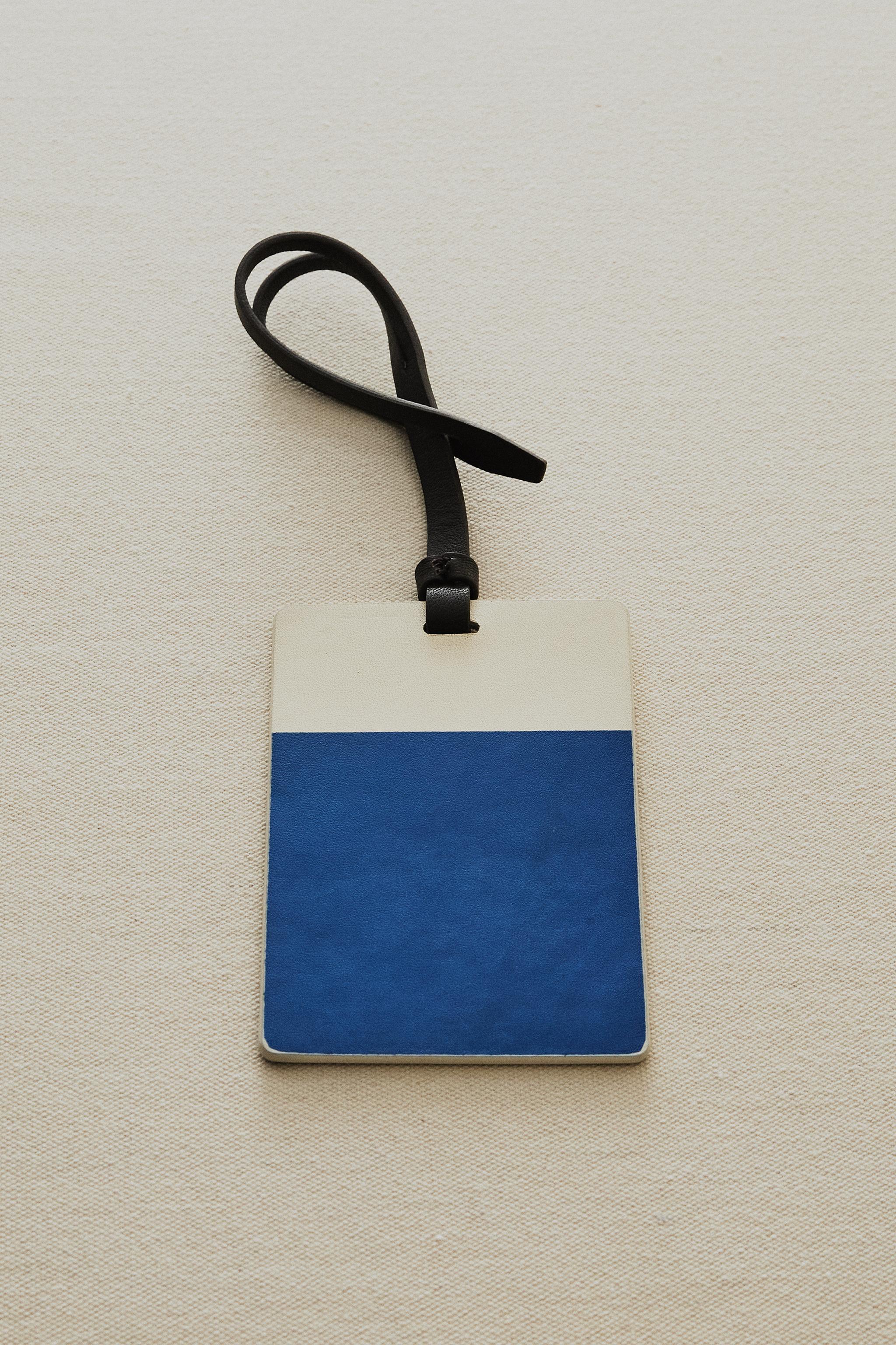 ÉTIQUETTE BAGAGE CUIR