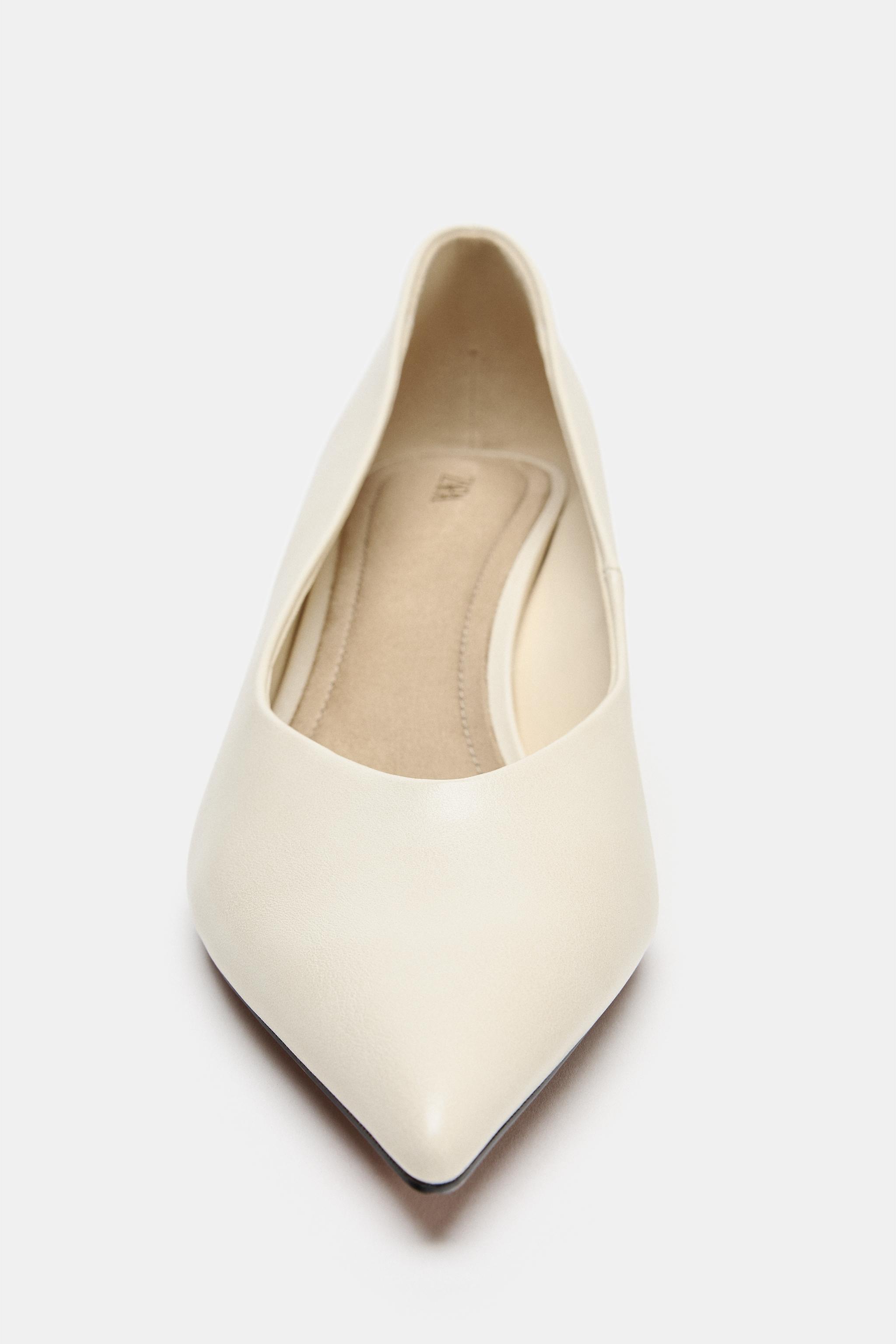 CHAUSSURES À TALONS COMPENSÉS