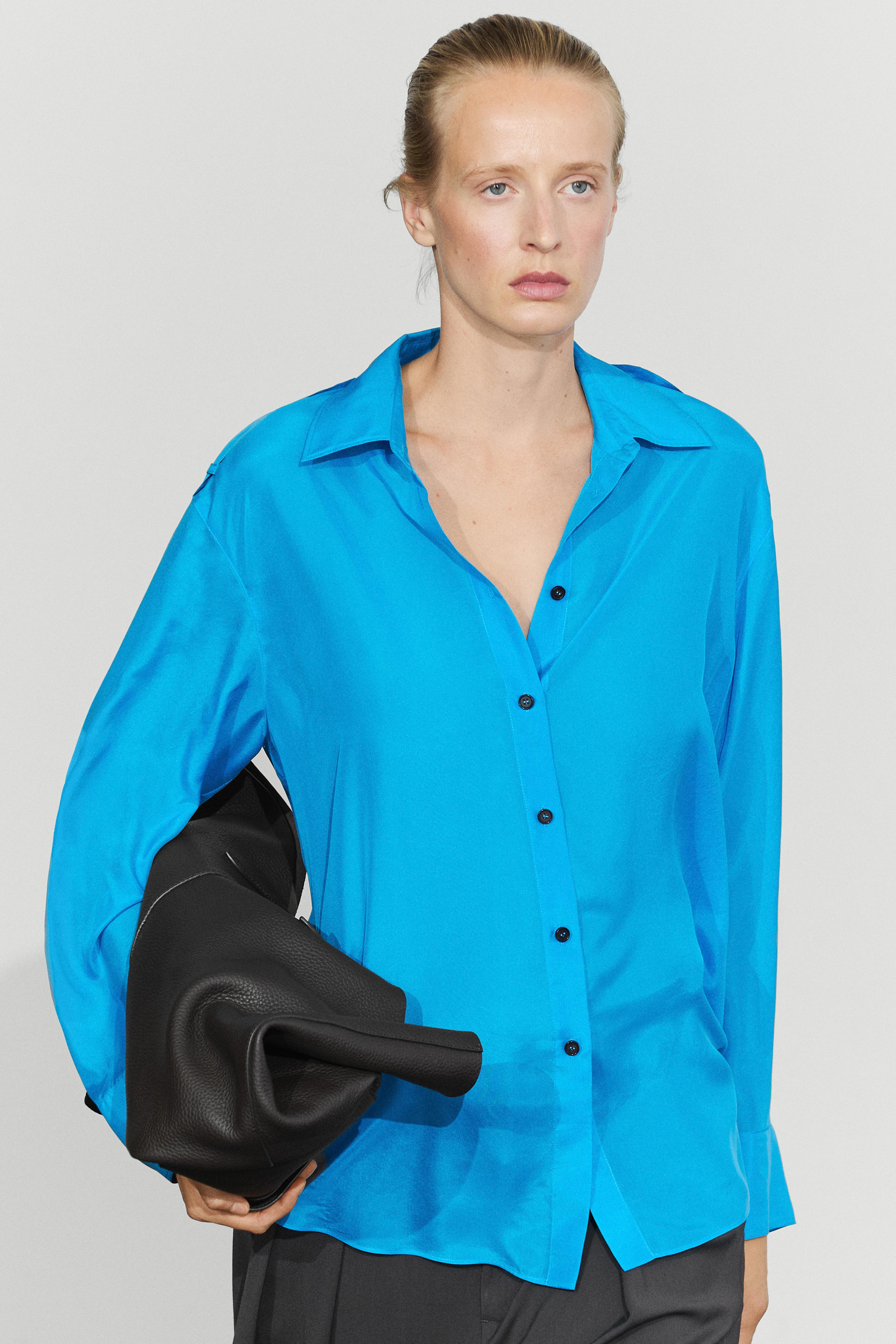 100% silk flowing shirt with shoulder detail
