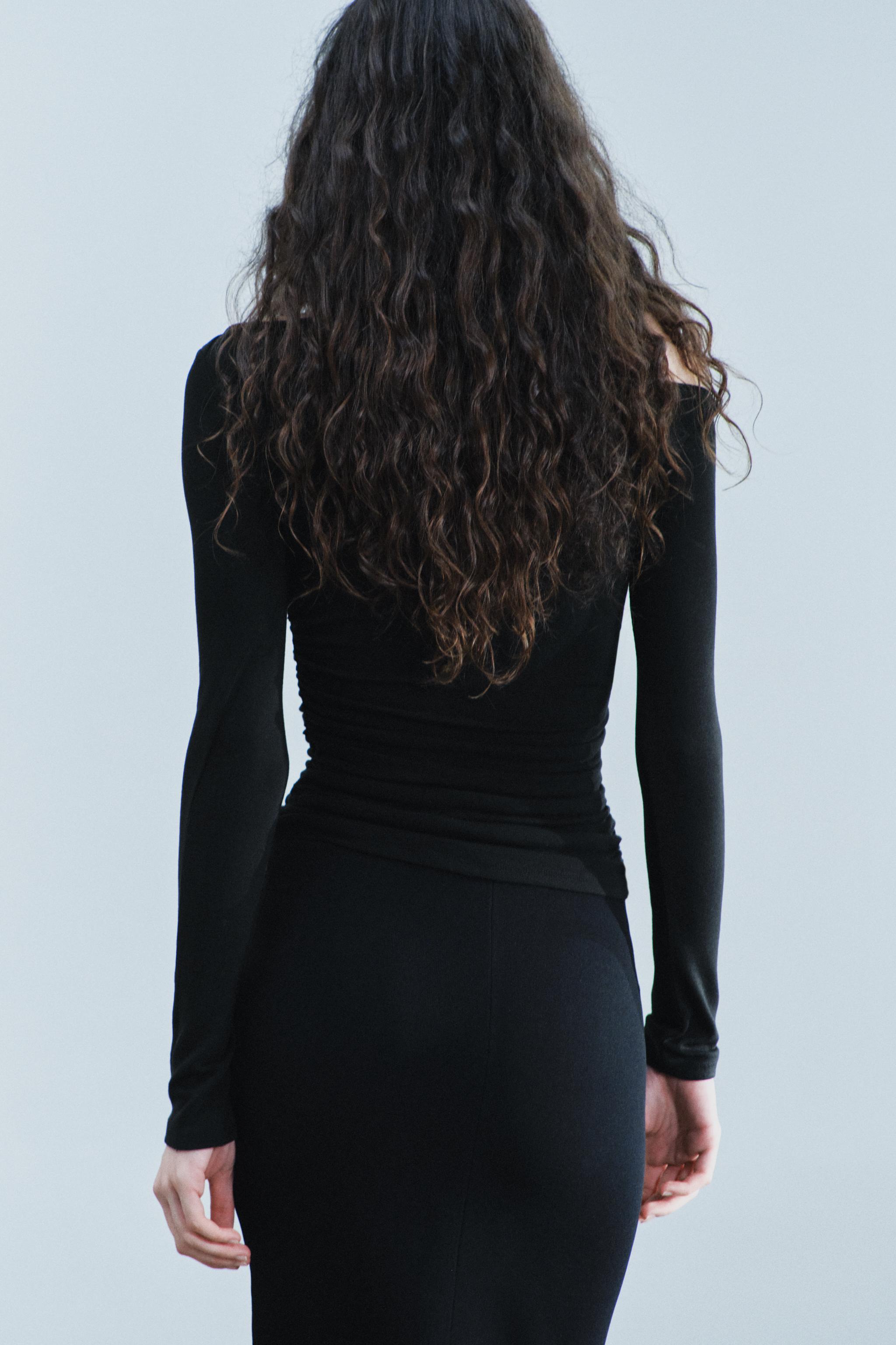 ASYMMETRICAL DRAPED TOP