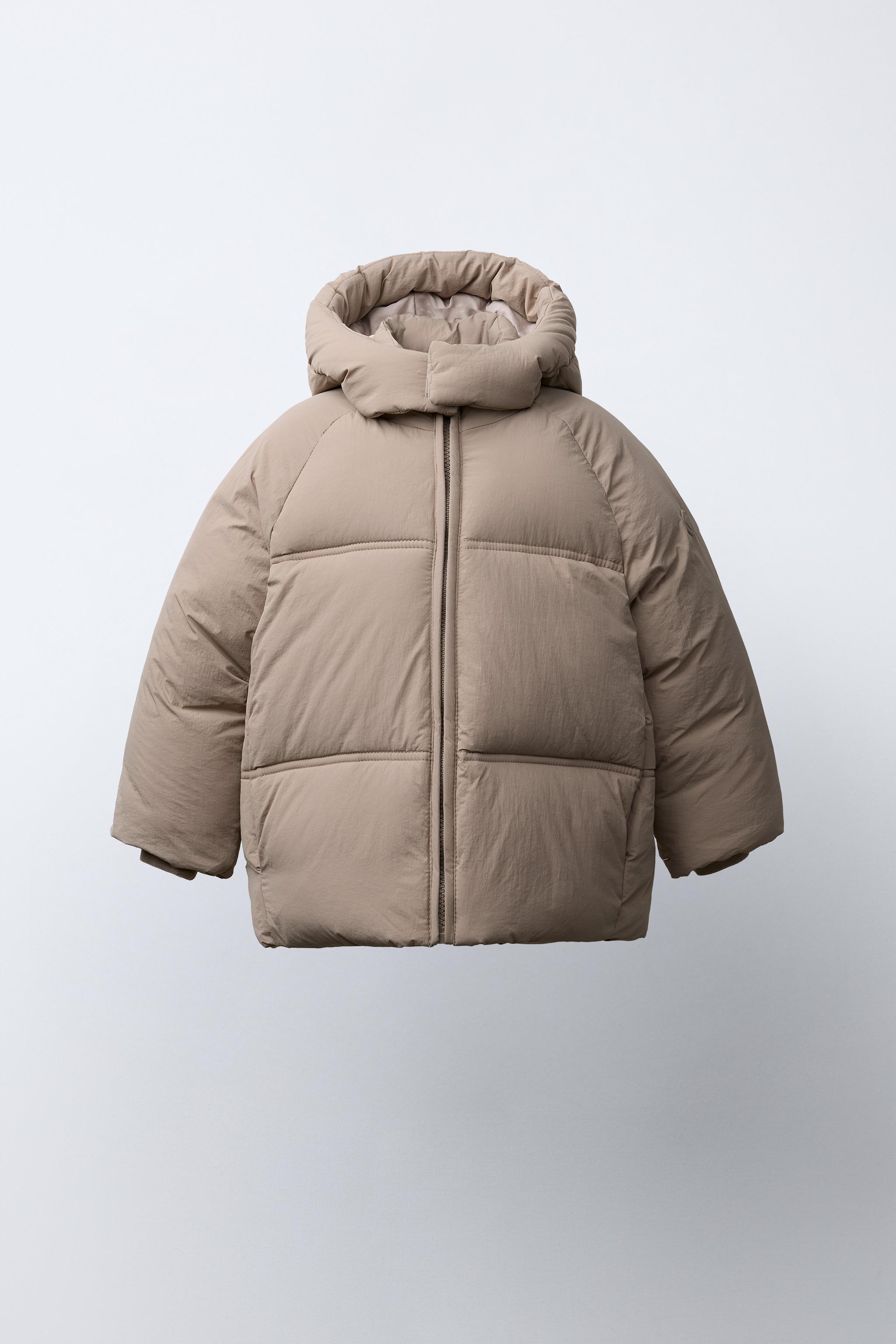 MANTEAU MATELASSÉ À CAPUCHE DÉPERLANT