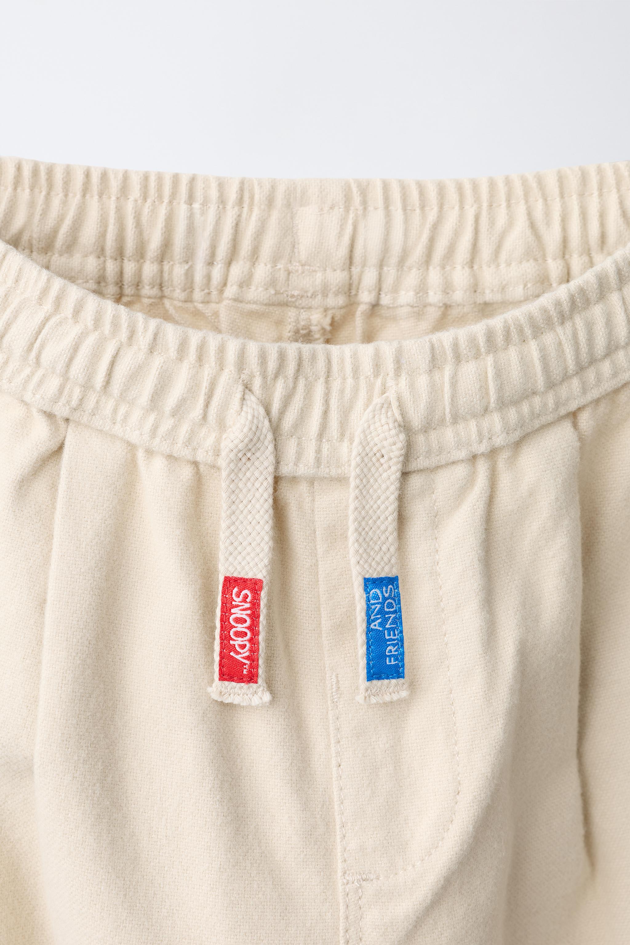 SNOOPY PEANUTS™ EMBROIDERED BAGGY PANTS