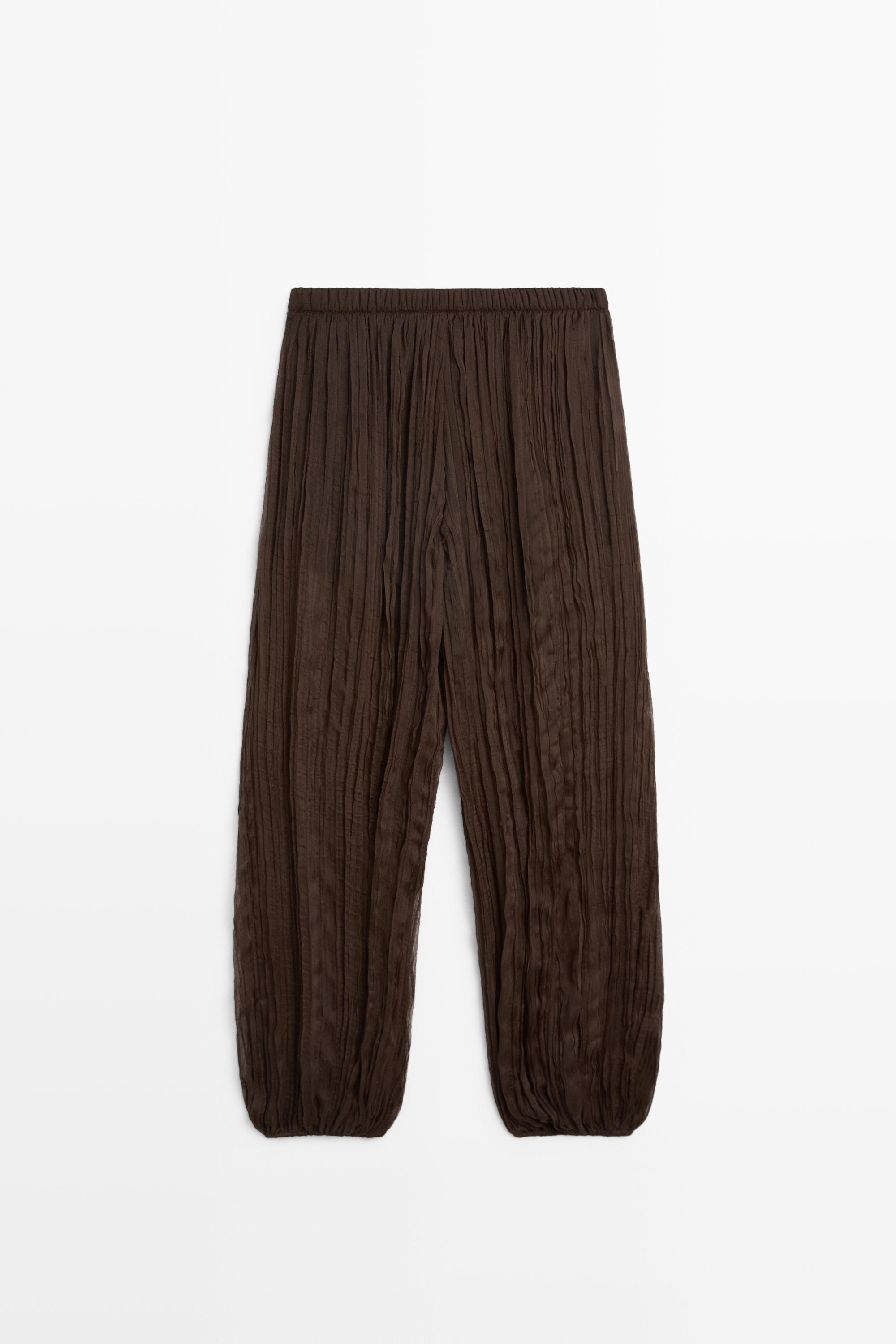 Total look flowing pants