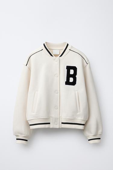 CAZADORA BOMBER FELPA TEXTO BORDADO - Crudo de Zara