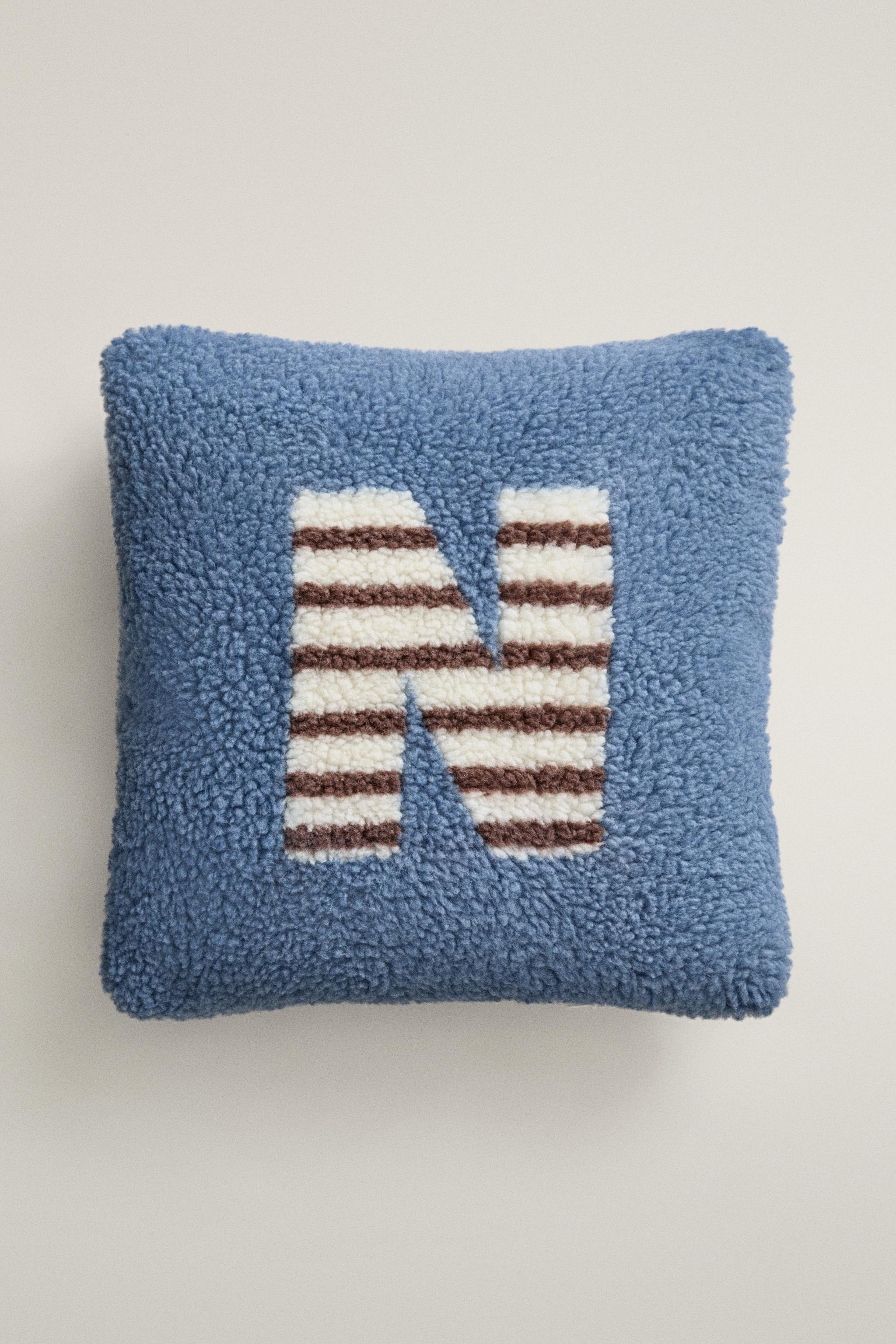 CHILDREN'S FAUX SHEARLING CUSHION WITH N — Blue