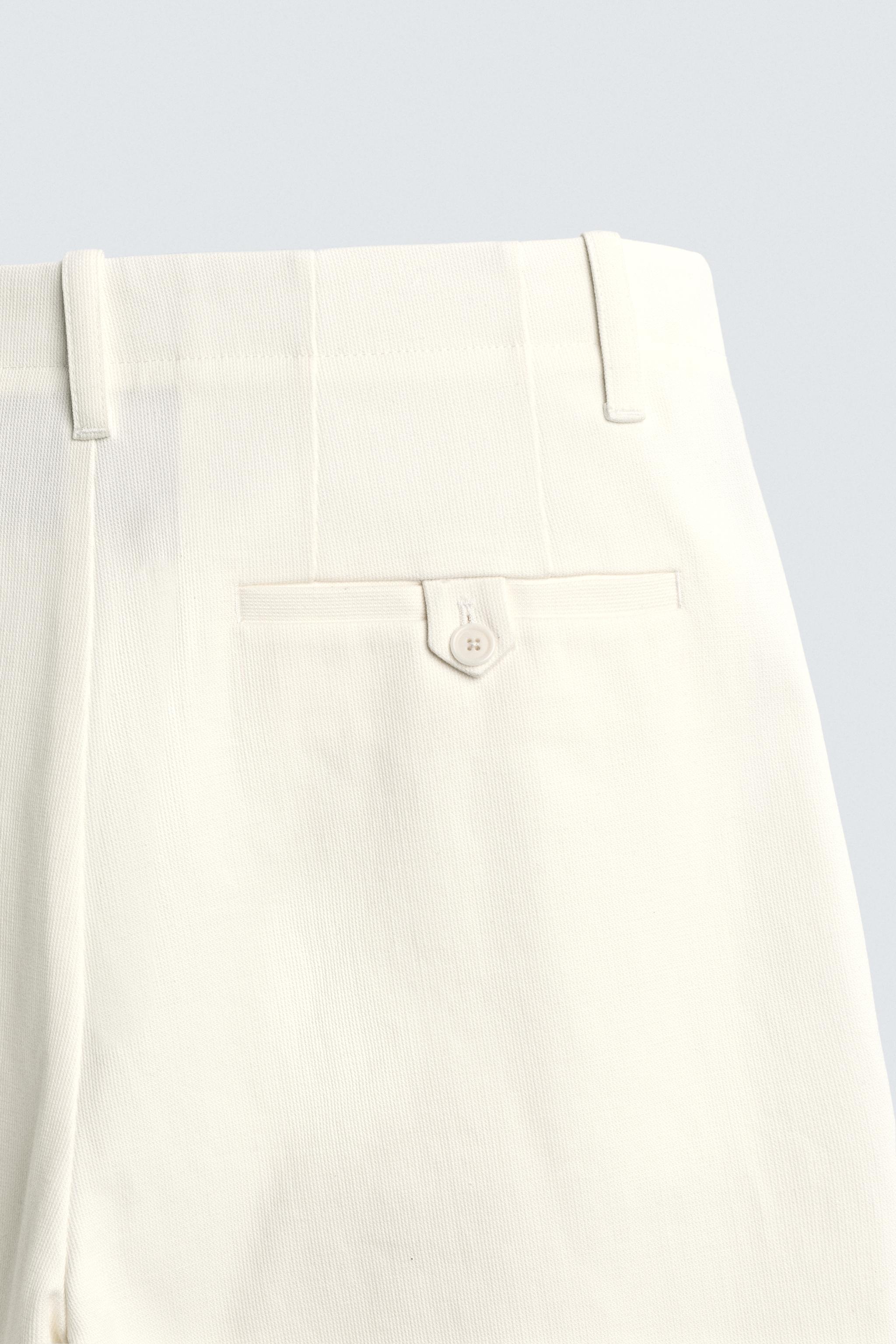 PANTALON CHINO COUPE AMPLE À PLIS