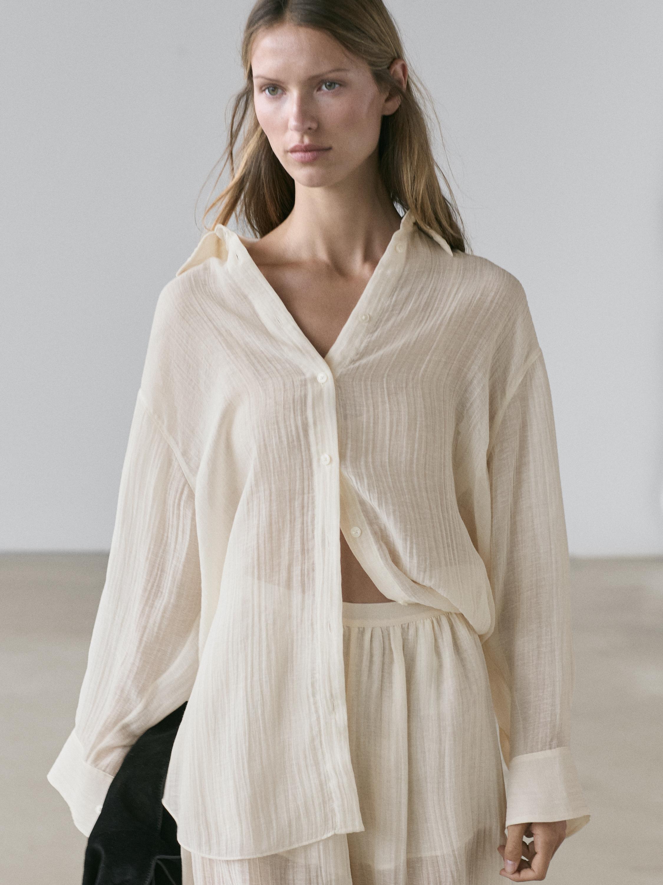 Flowing shirt with pleated detail