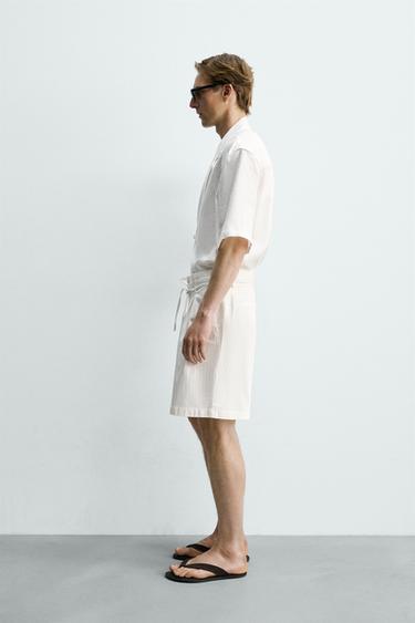 BERMUDA RELAXED FIT À PINCES - Écru de Zara - Image 3