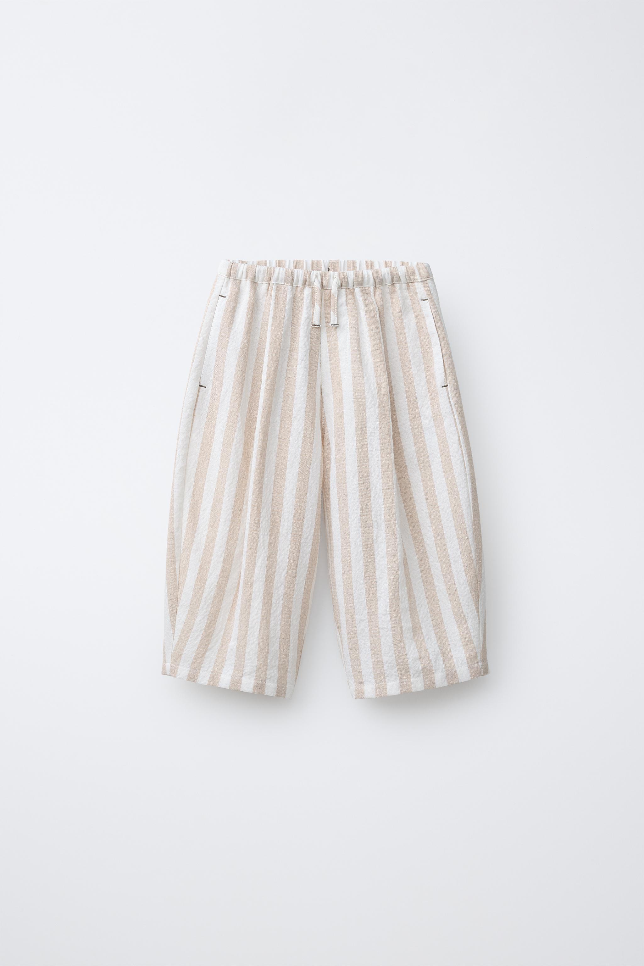 STRIPED PLEATED BALLOON PANTS