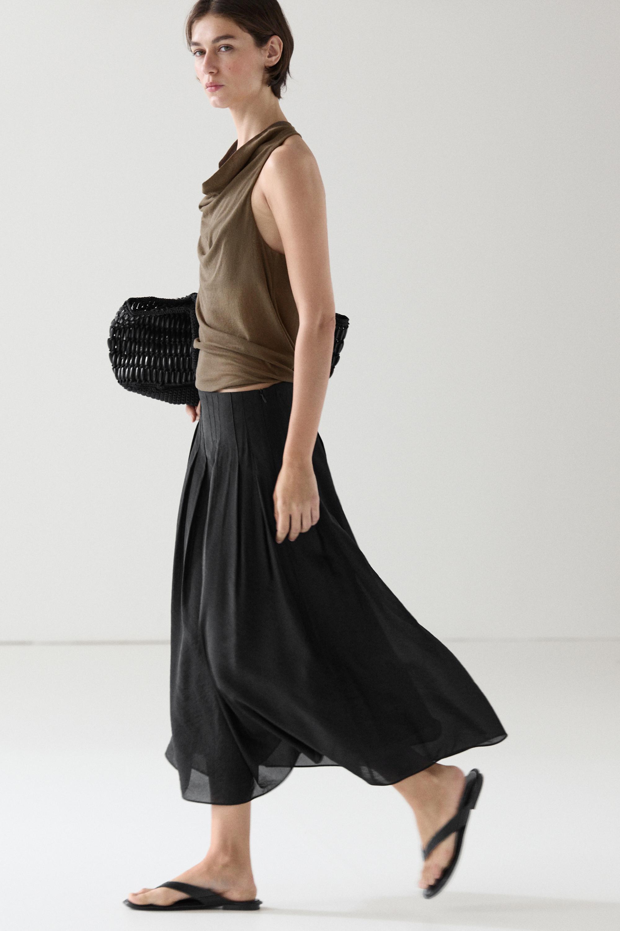 Flowing midi skirt with pintucks