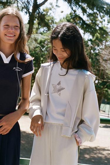 CHAQUETA CAPUCHA SPORTY VIVO RAYAS - Crudo de Zara
