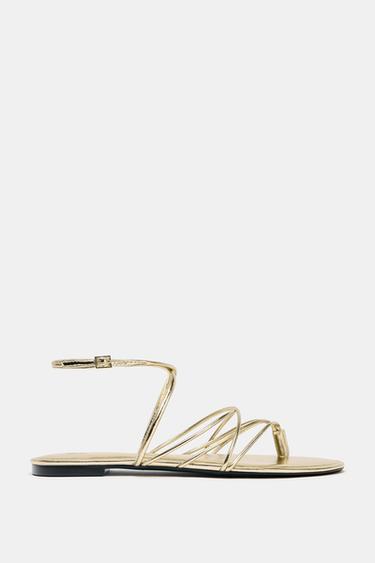 SANDALIA PLANA TIRAS DORADA - Oro de Zara