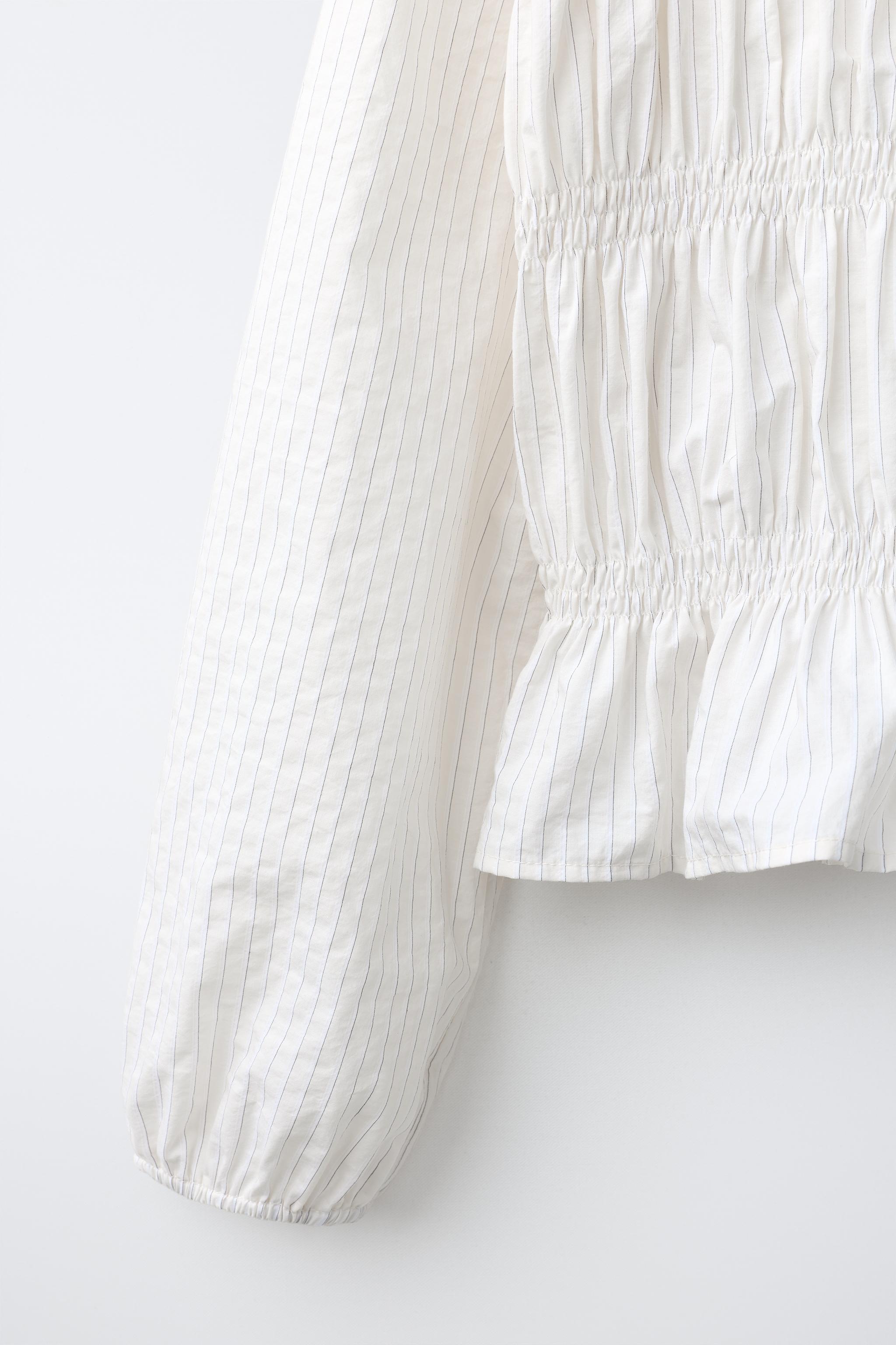 BLOUSE À RAYURES ET ÉLASTIQUES