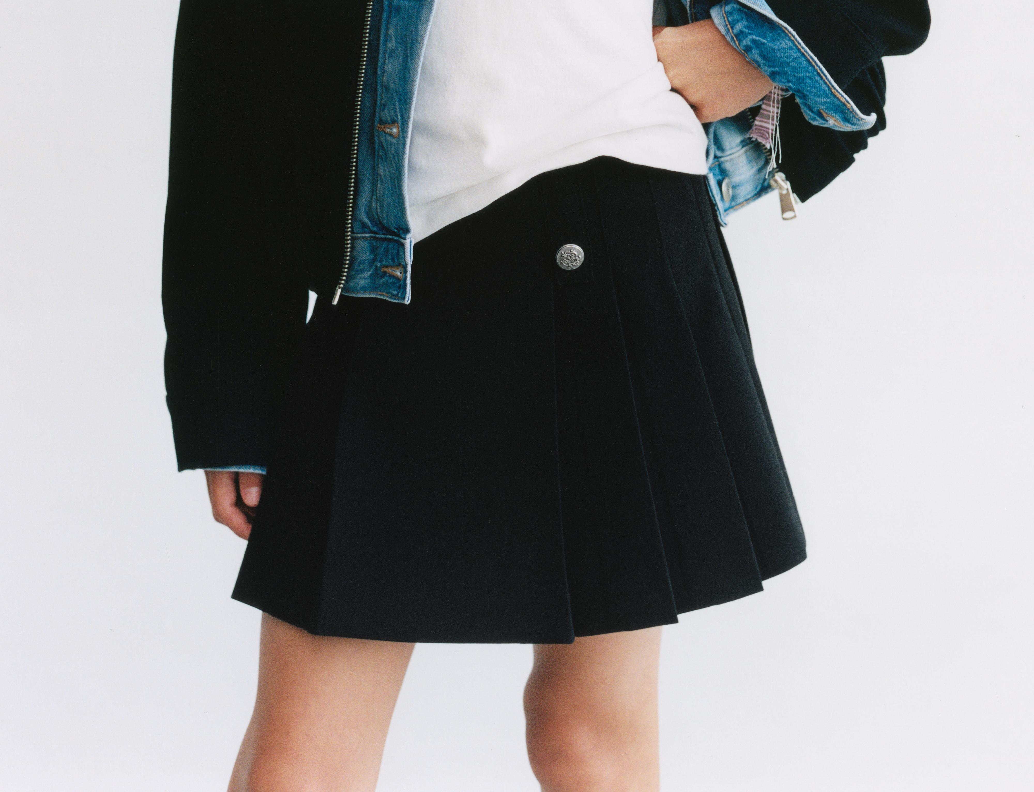 BUTTONED PLEATED SKIRT — Black