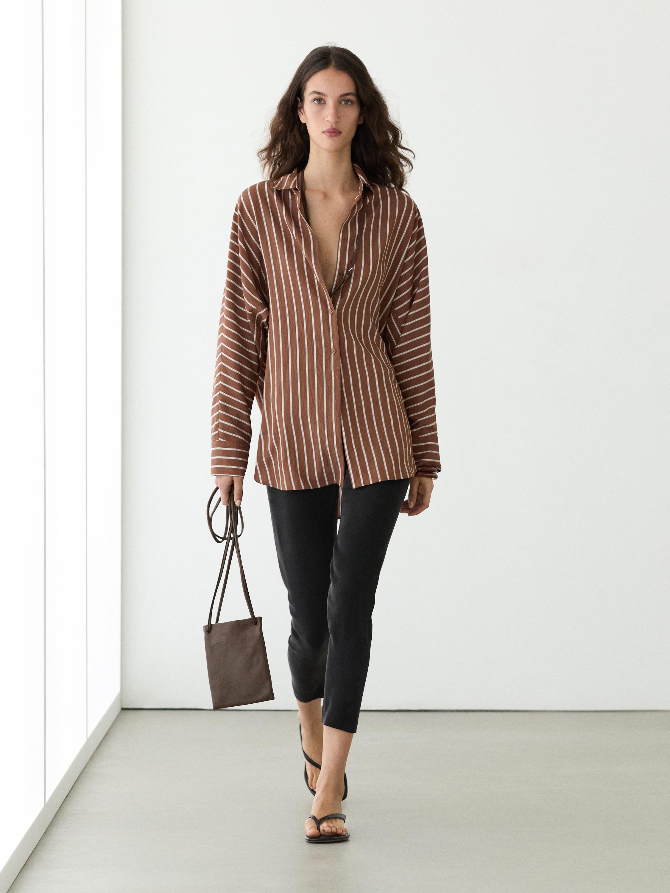 Flowing striped shirt with batwing sleeves