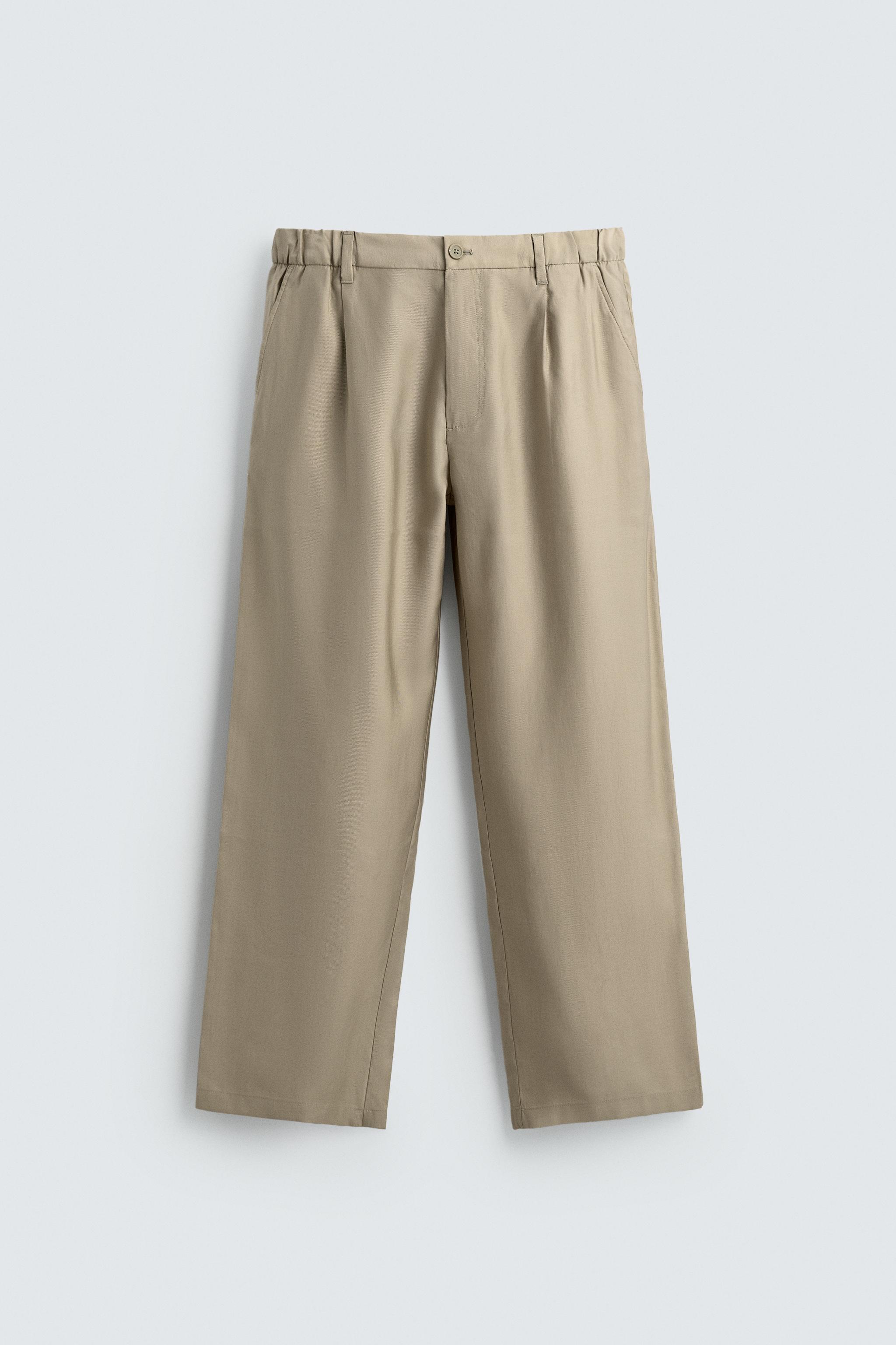 FLOWY PLEATED PANTS