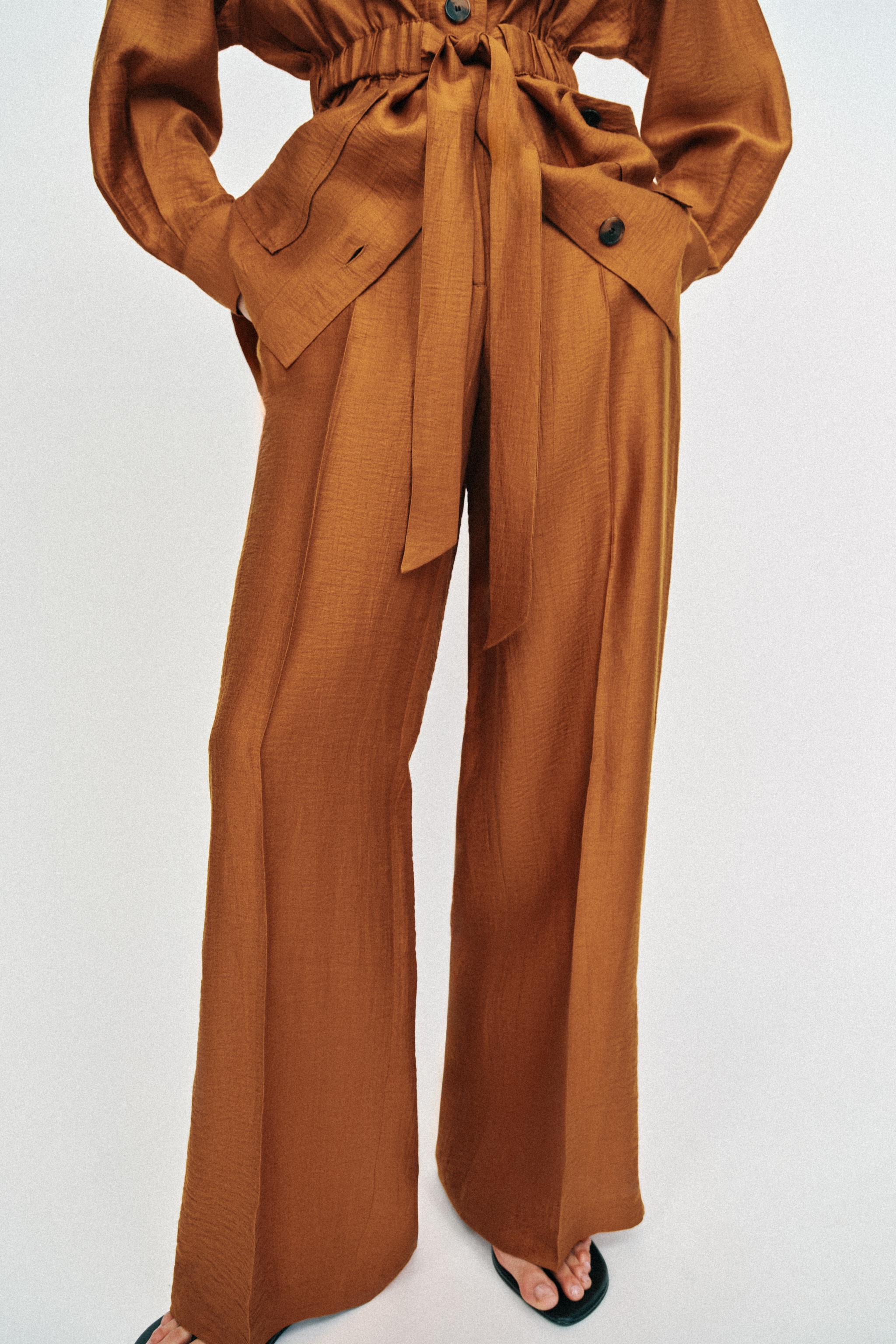 PANTALON FLUIDE EN LIN À FENTES
