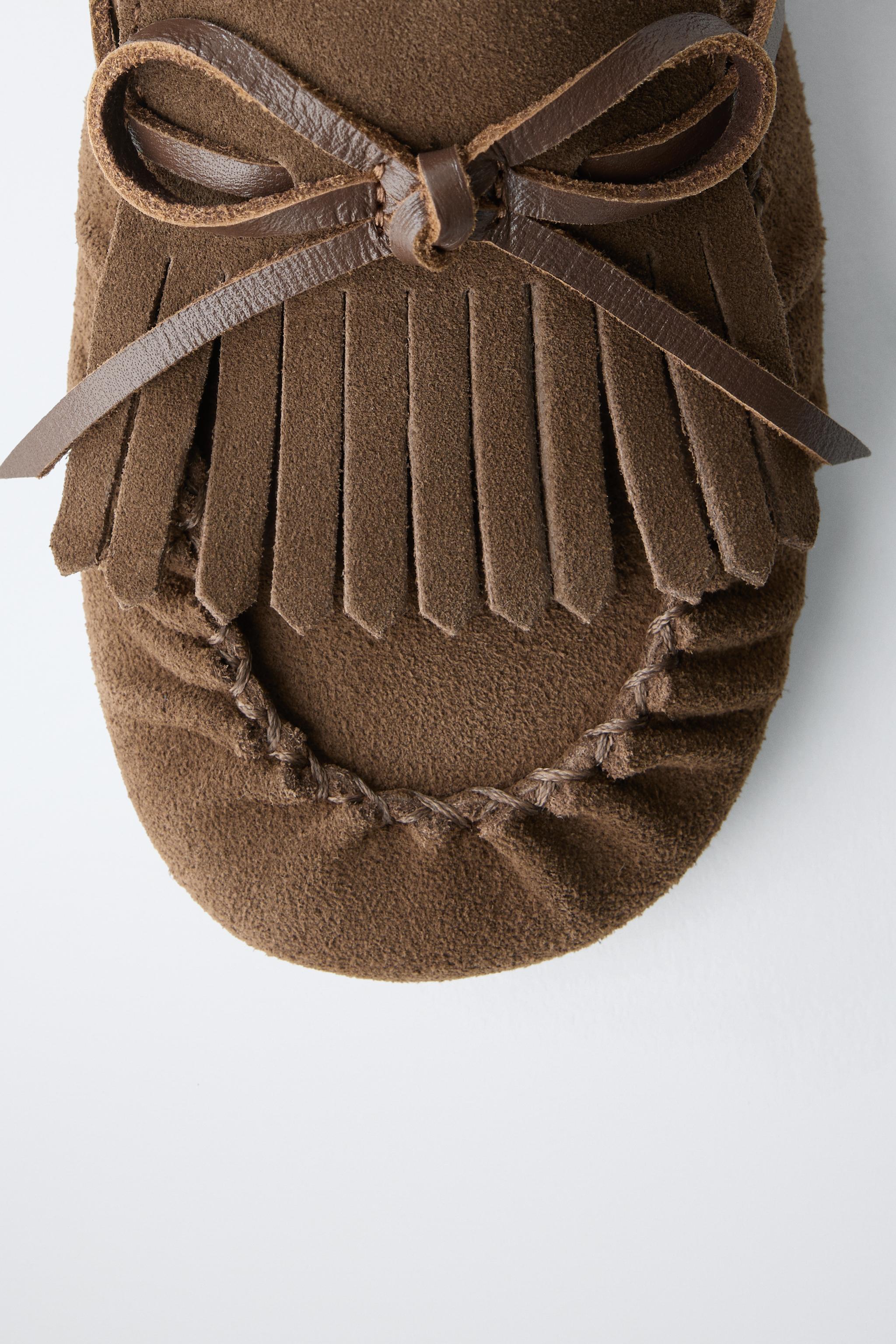 MOCASSINS À FRANGES