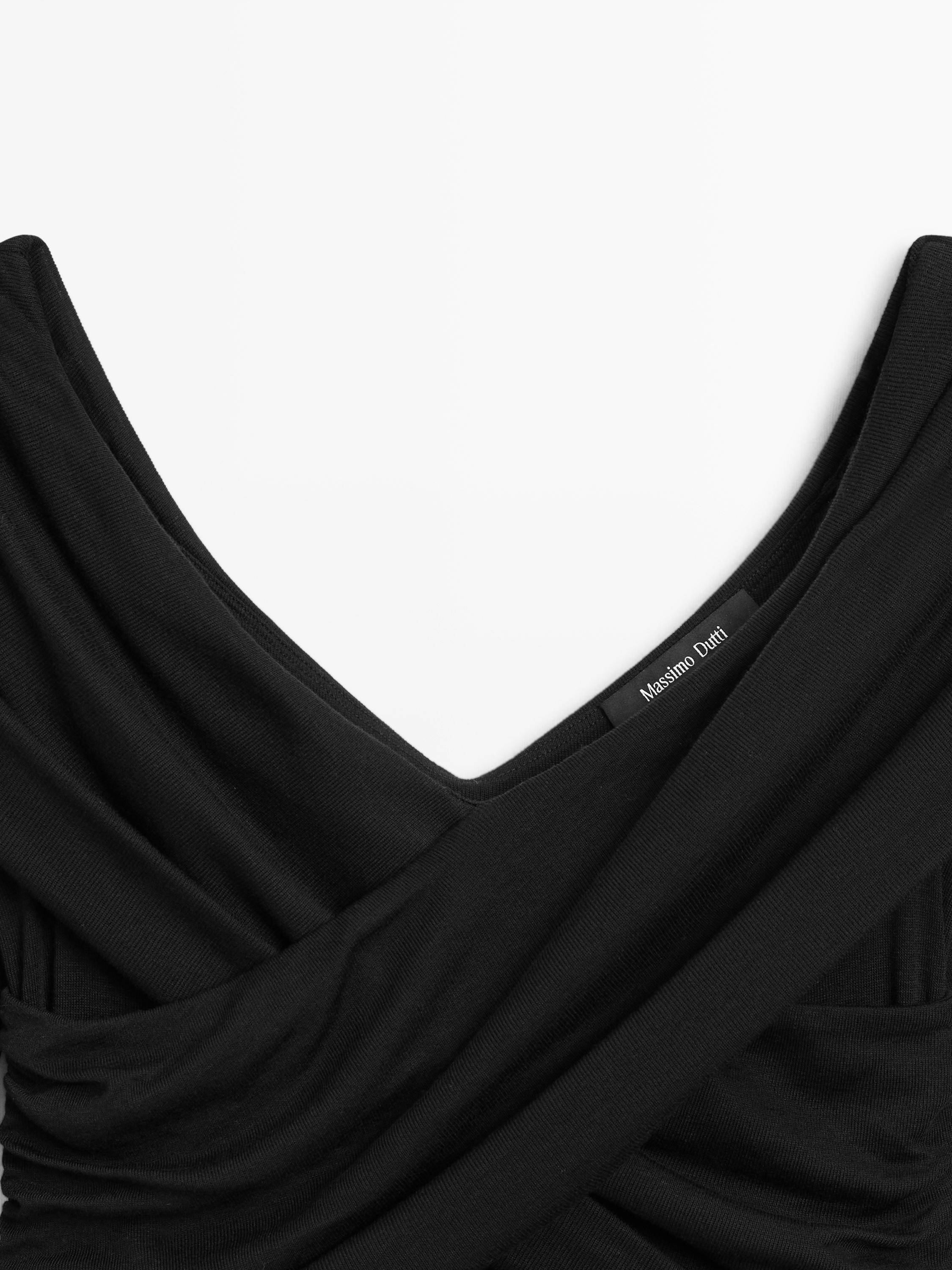 Off-the-shoulder lyocell and wool blend top