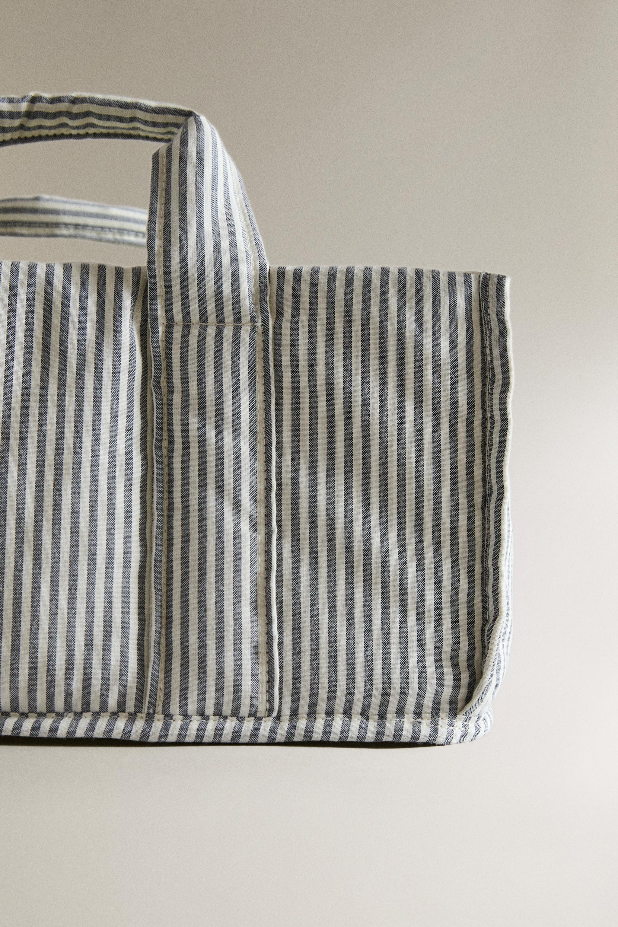 STRIPED BABY CLOTHES ORGANIZER WITH HANDLE