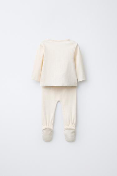 SOUPRAVA A TAŠKA POINTELLE SE SRDÍČKY PRO MIMINKA - Máslo od Zara