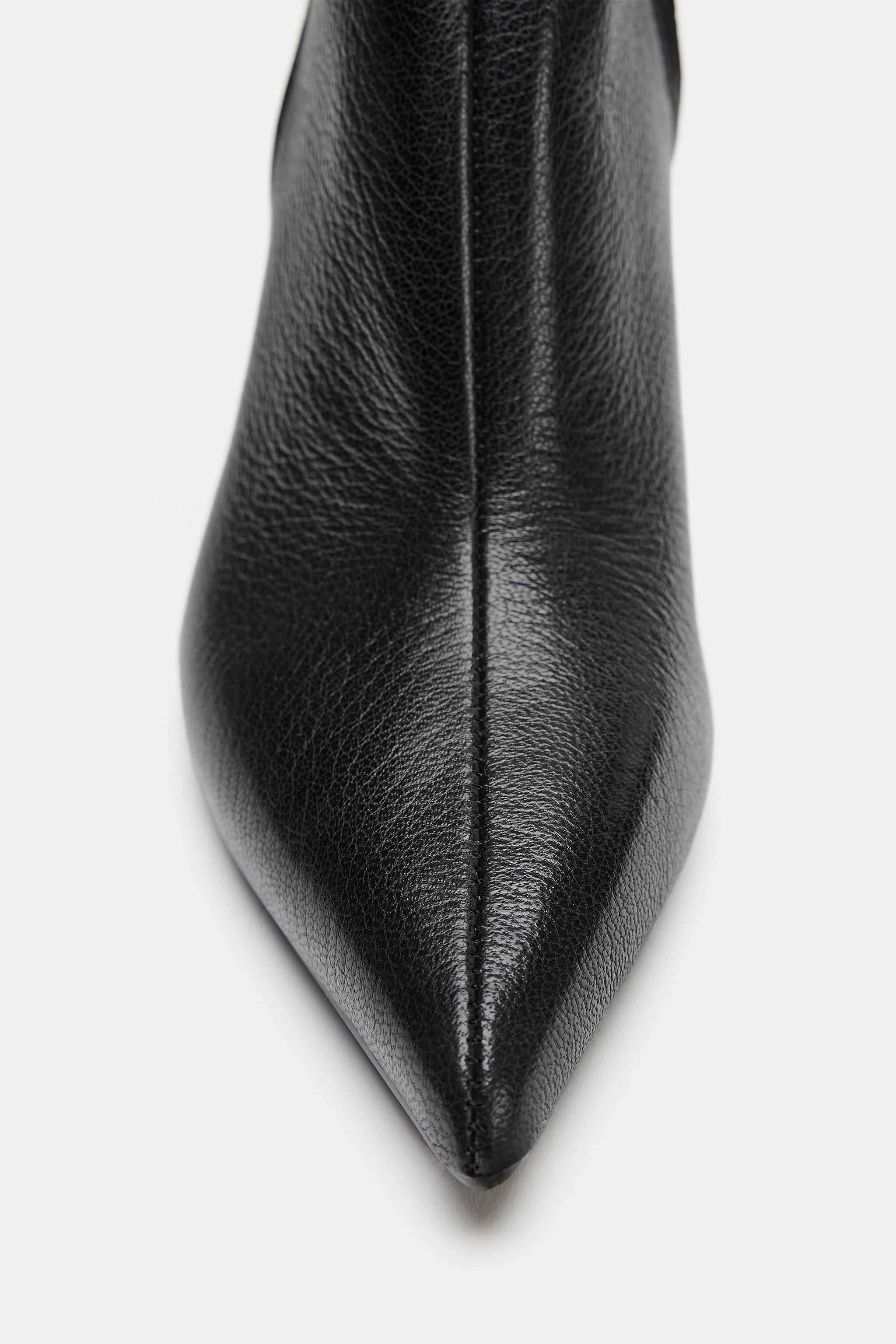 BOTTINES À TALONS EN CUIR
