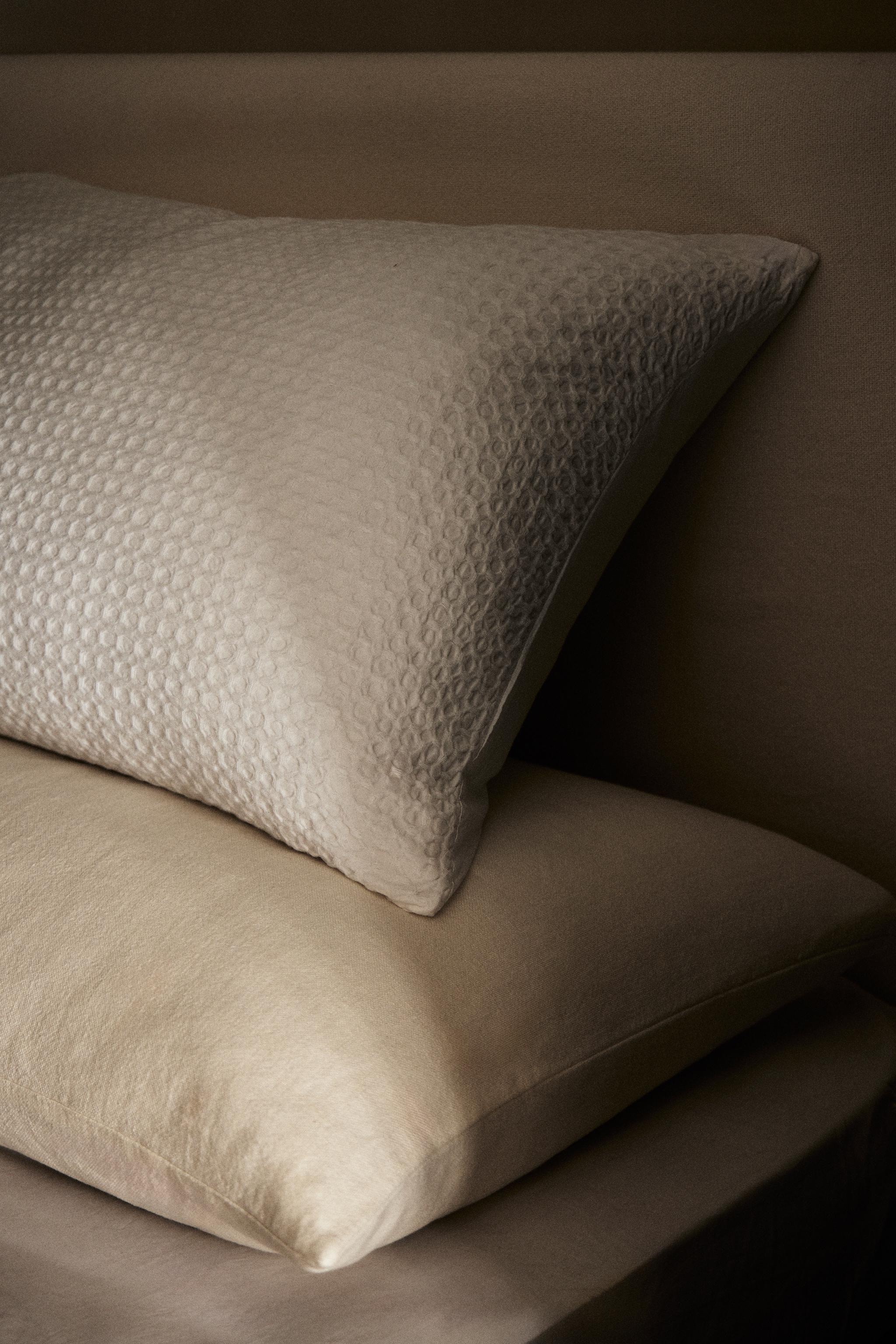 TAIE D’OREILLER GAUFRÉE