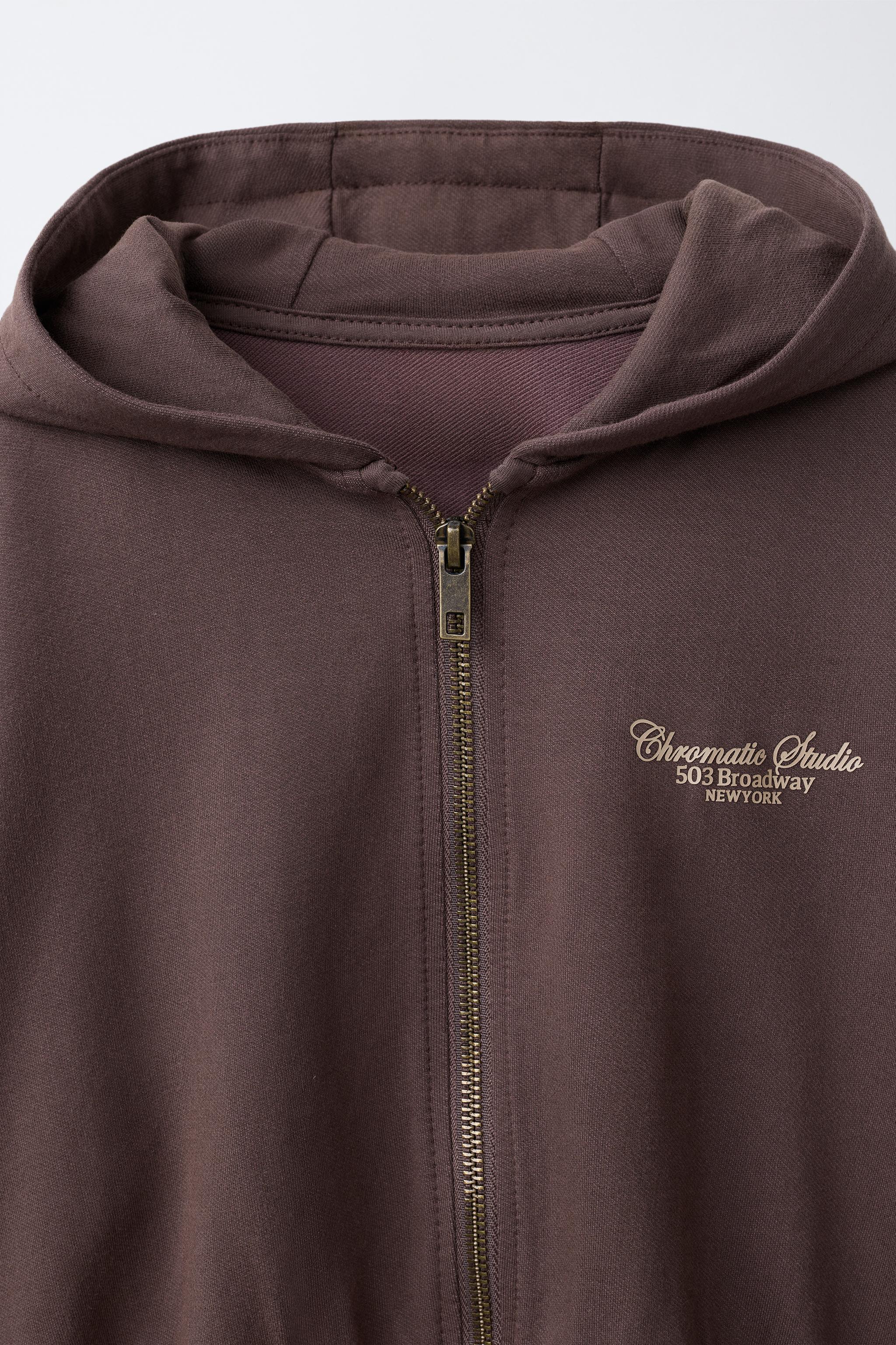 RAISED TEXT HOODIE