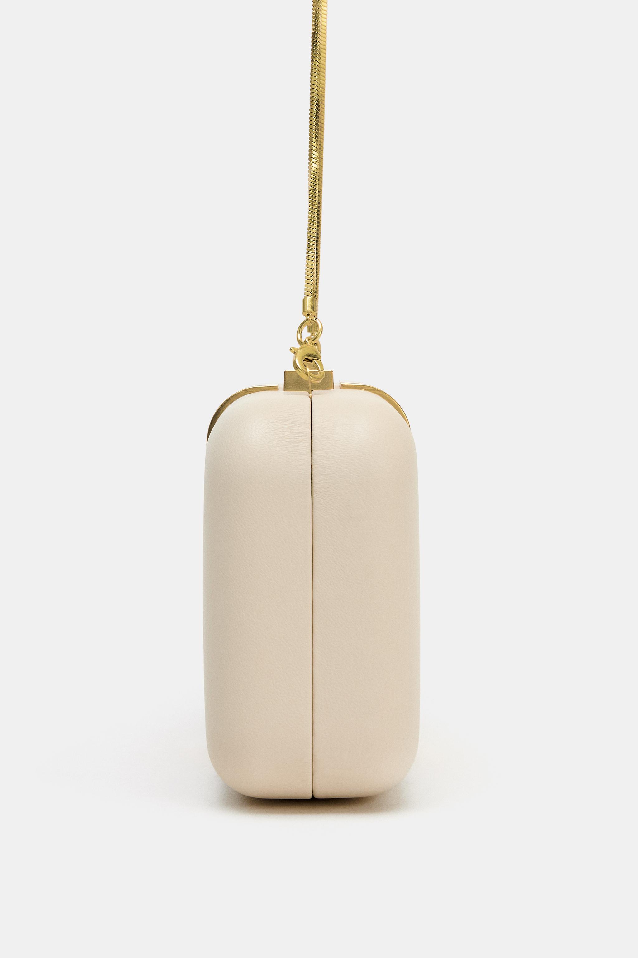 POCHETTE À DÉTAIL MÉTALLIQUE