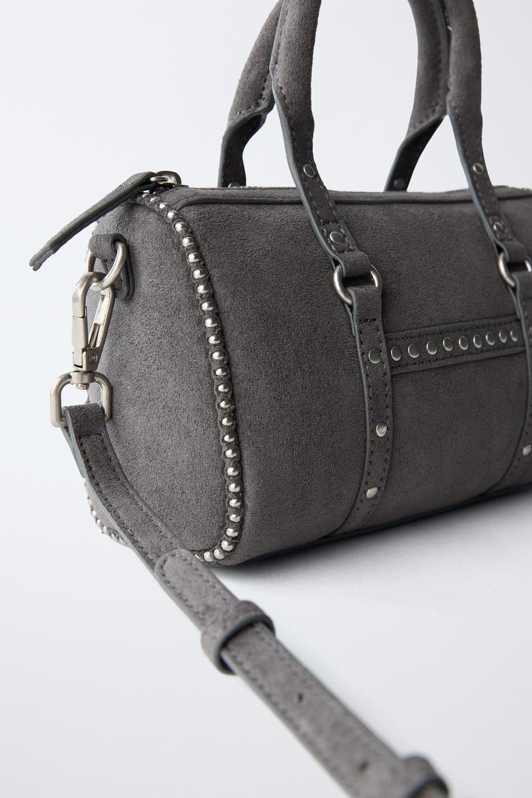 BOLSA CRUZADA CON TACHAS 3