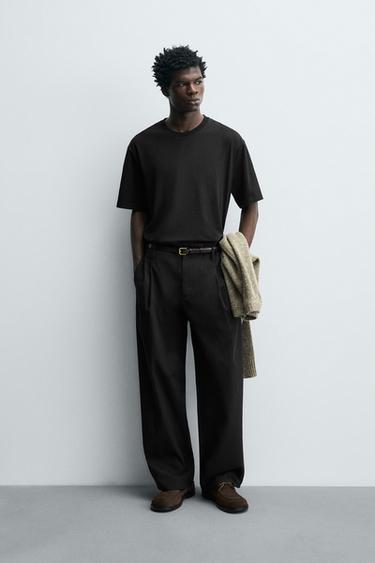 تيشرت تقني بهيكل بيكيه - أسود الخاص بـ Zara