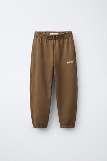 TEXT JOGGERS - Ochre by Zara