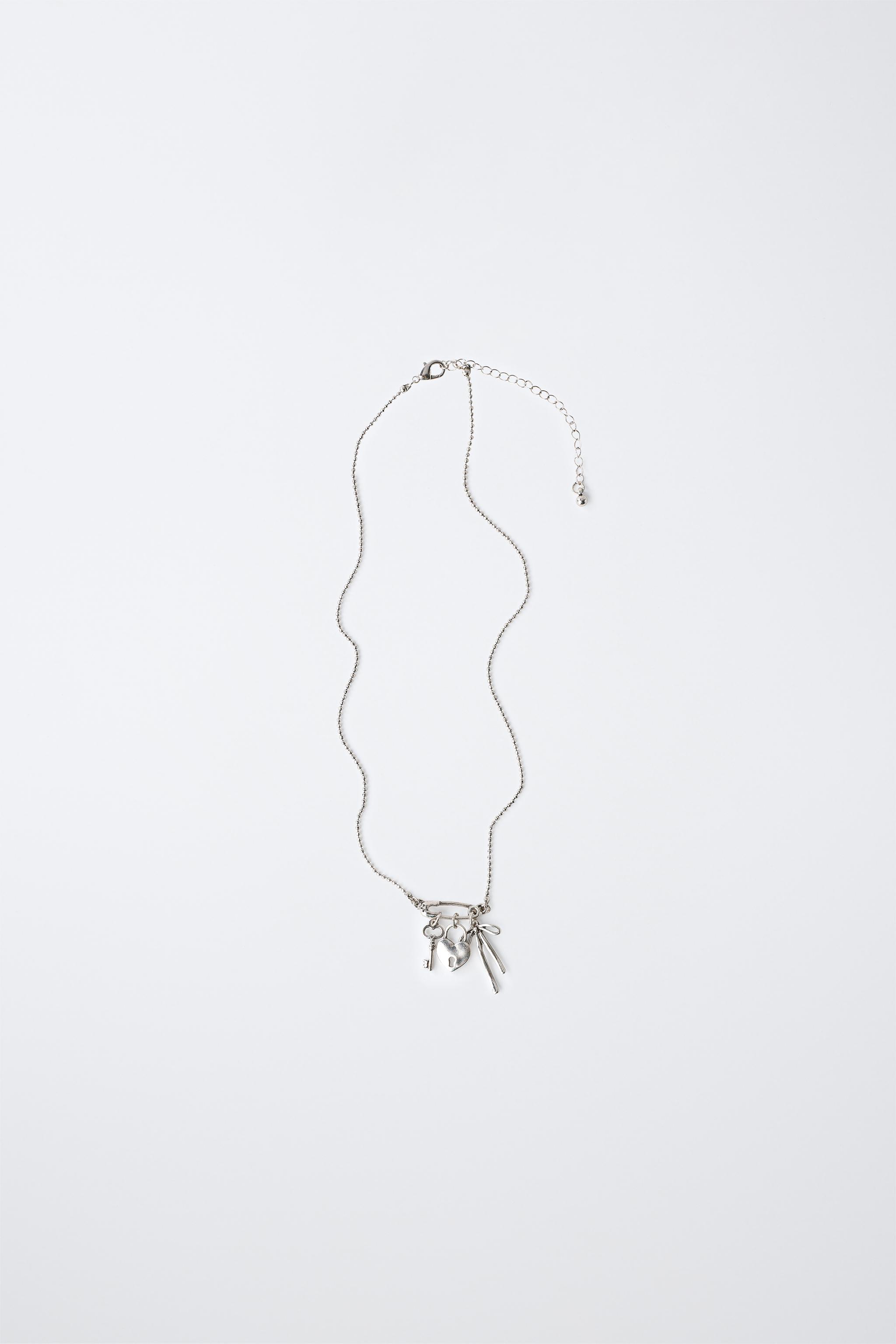 KEY, BOW, AND PADLOCK CHARM NECKLACE — Silver