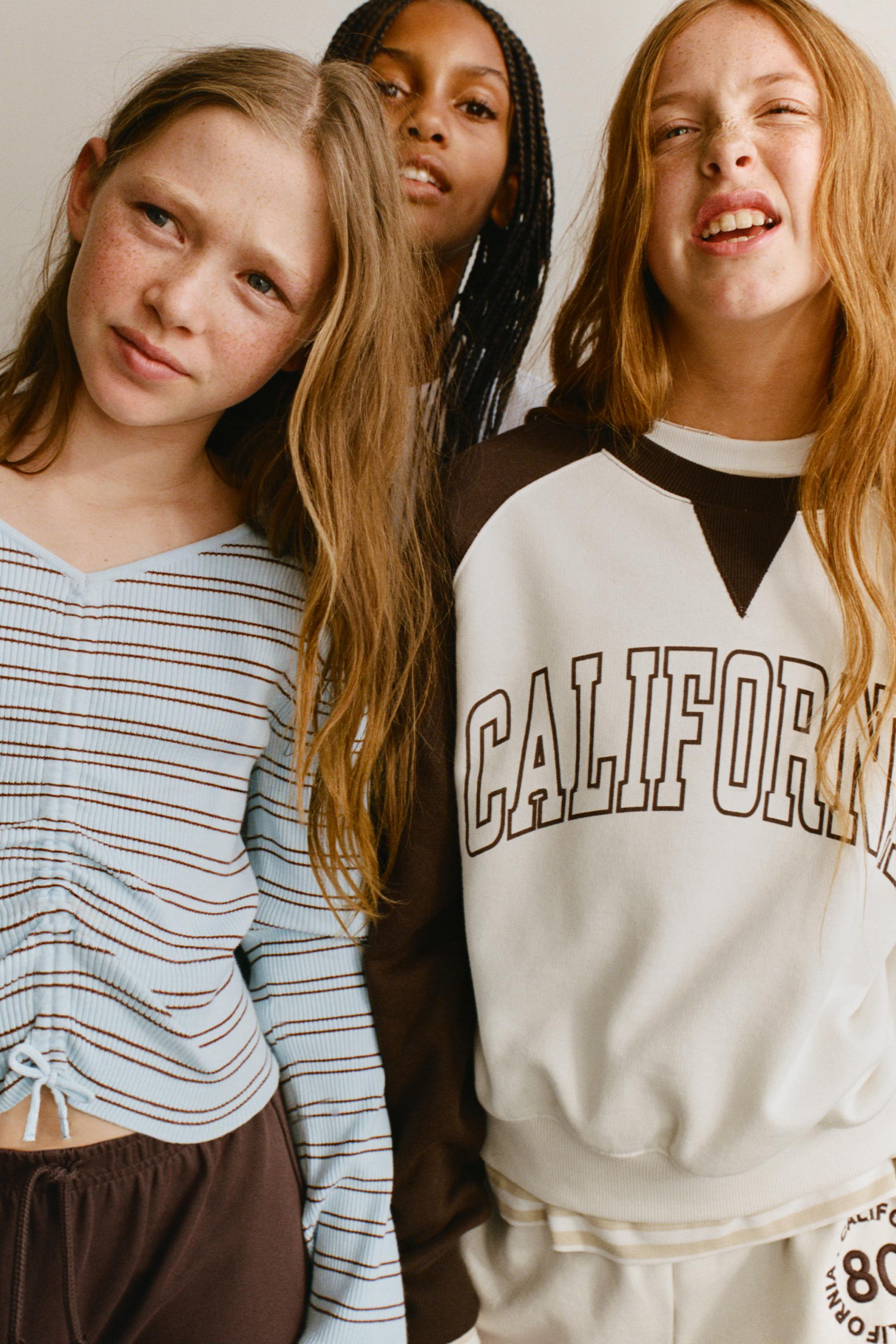 RUFFLED RIBBED JUMPER