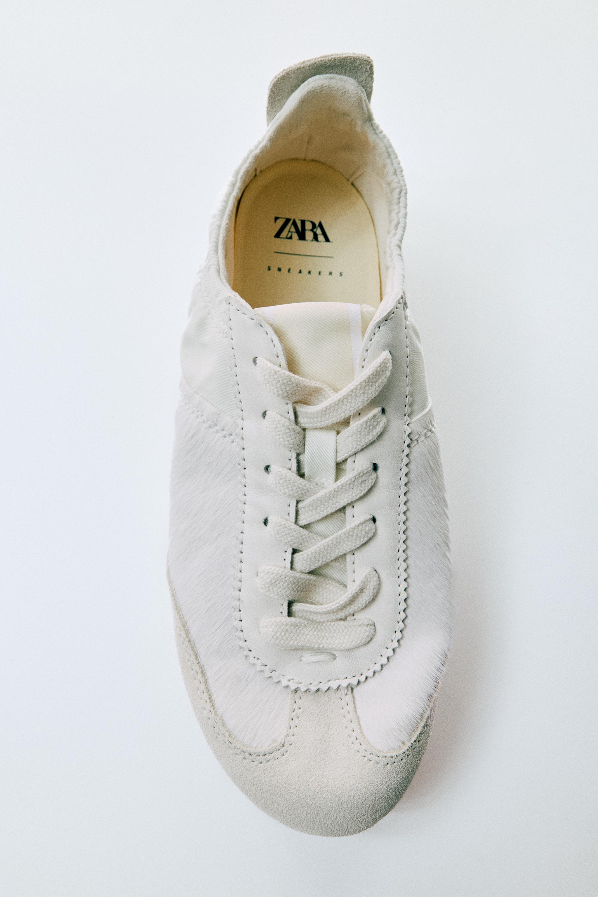 TRAINERS WITH ELASTICATED HEEL