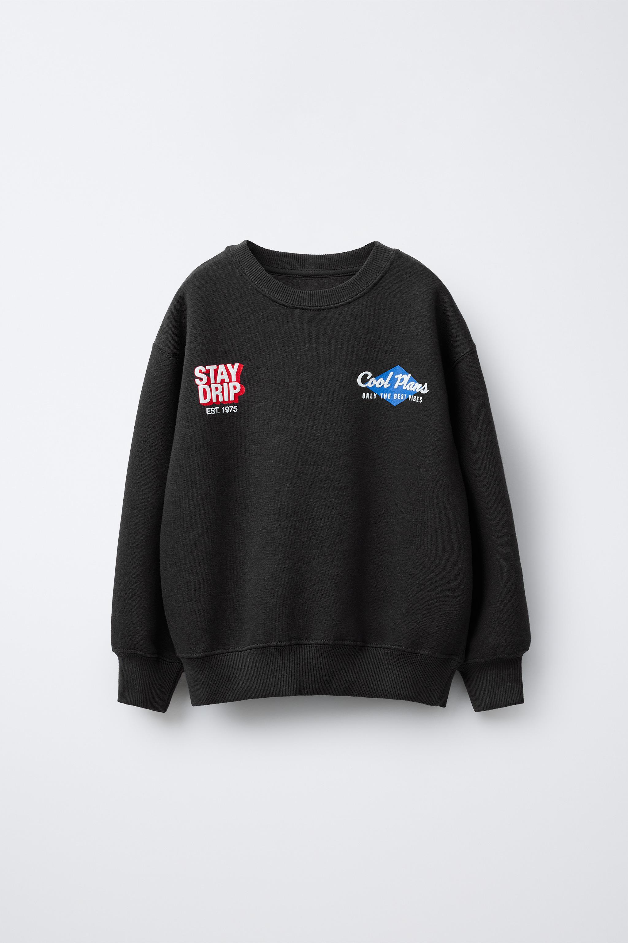 RAISED TEXT SWEATSHIRT