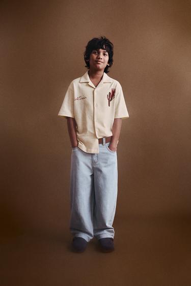 جينز بقَصّة واسعة - أزرق فاتح الخاص بـ Zara