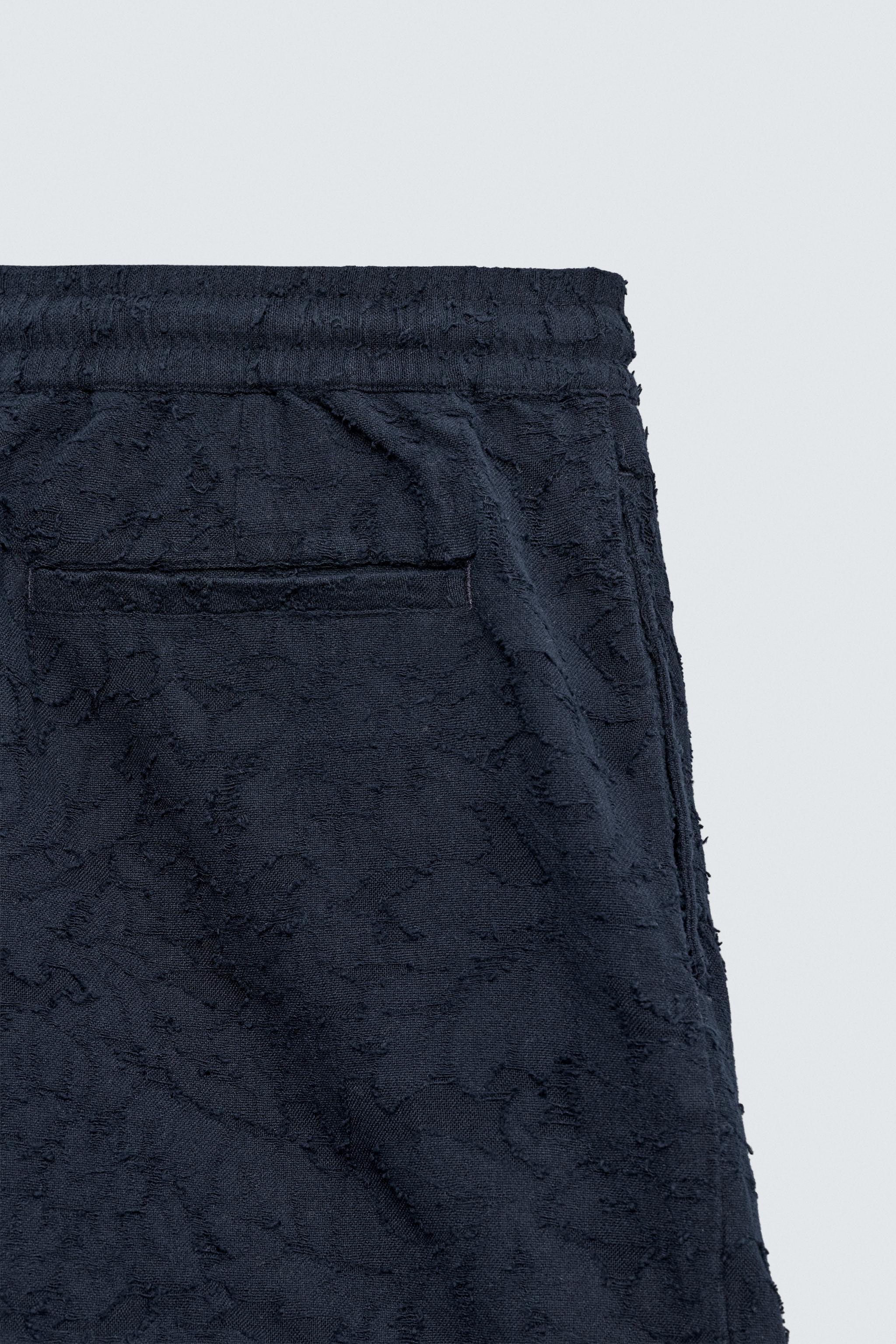 SHORT JACQUARD TEXTURÉ