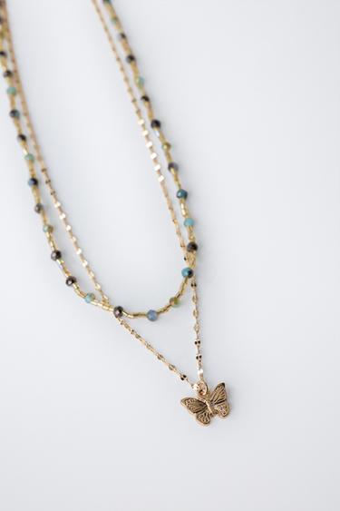 PACK OF TWO NECKLACES WITH BUTTERFLY BEADS - Golden by Zara - Image 1