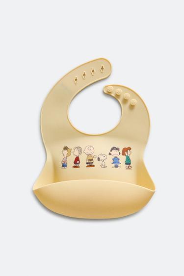 BABERO INFANTIL SILICONA PEANUTS™ - Amarillo claro de Zara