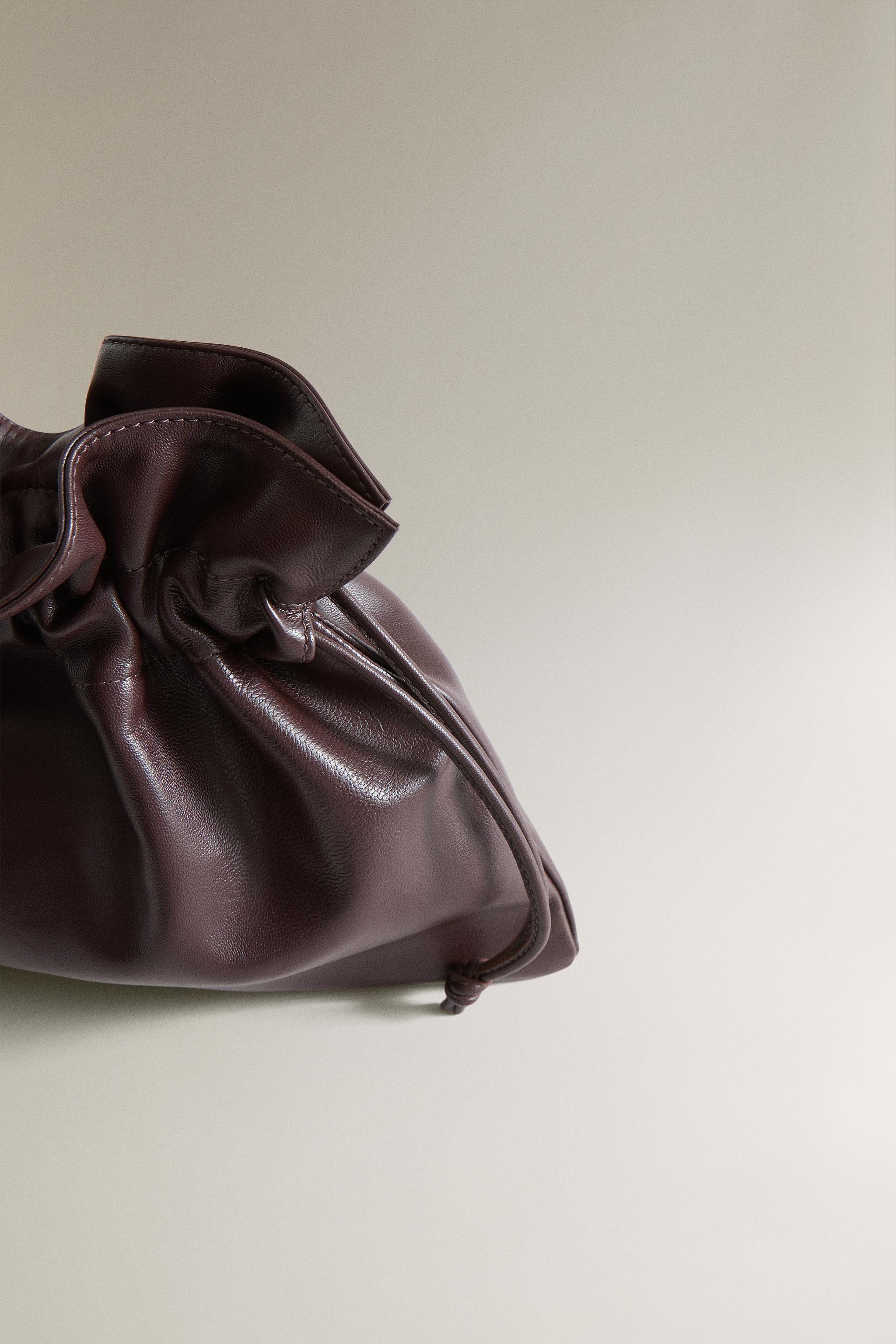 POCHETTE EN CUIR
