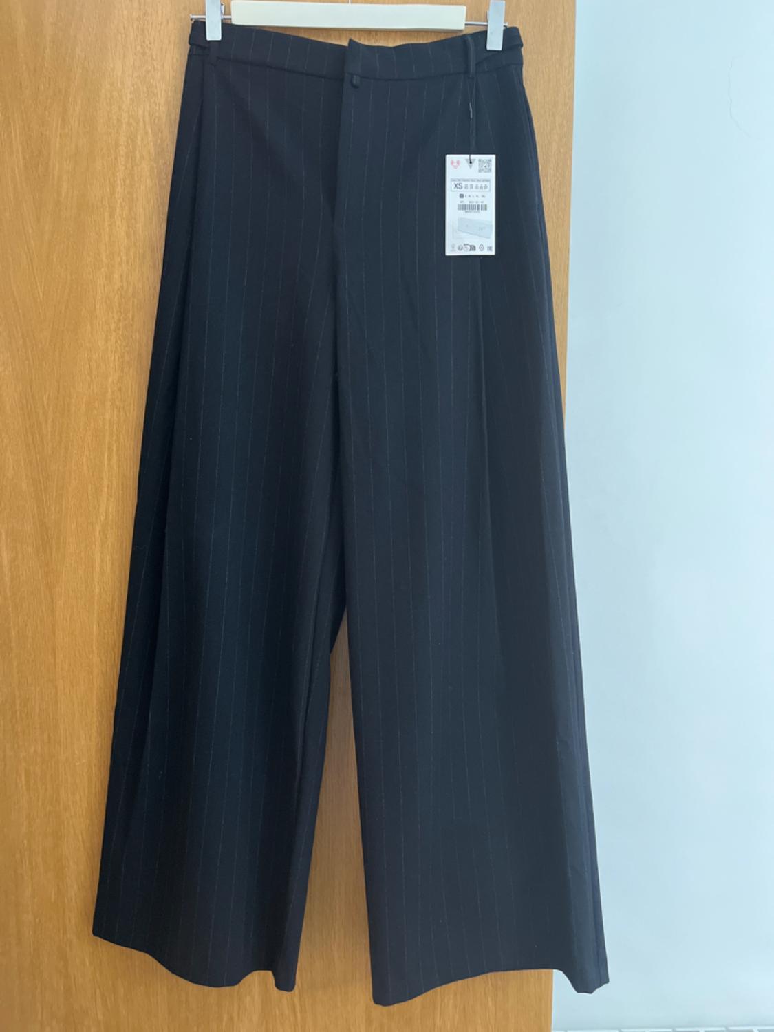 PINSTRIPED FLANNEL TROUSERS