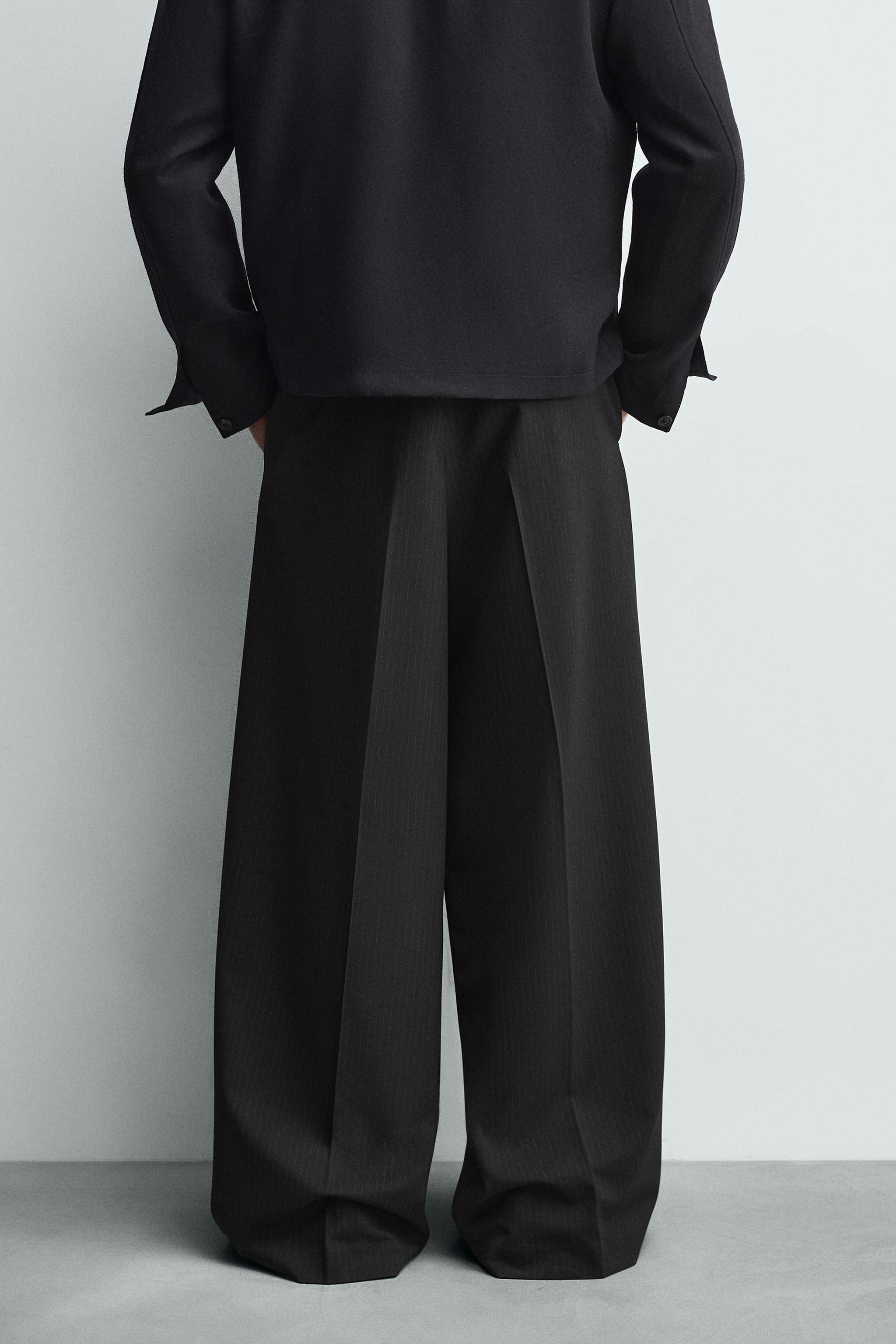 PLEATED WIDE FIT PANTS