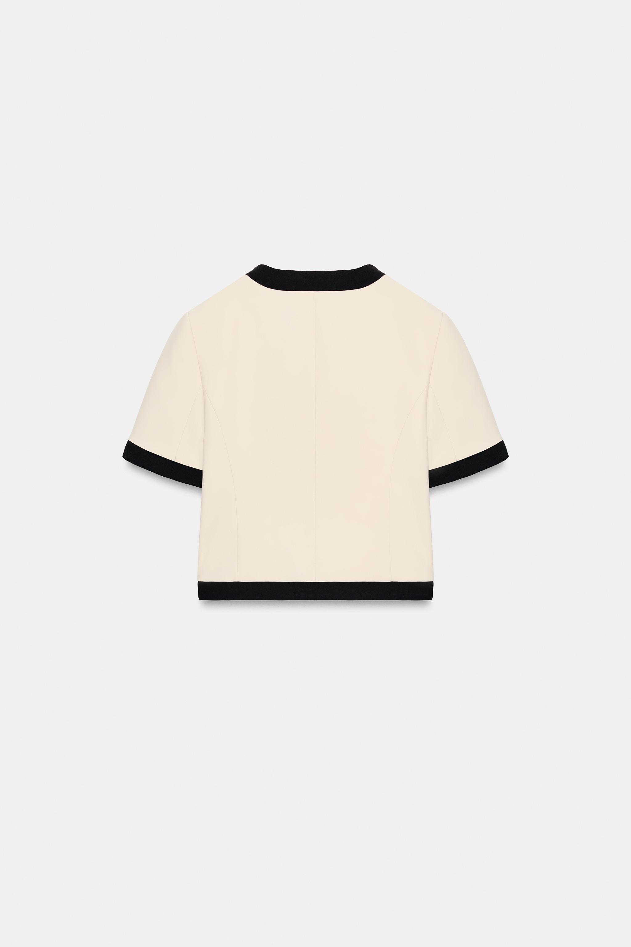 VESTE MANCHES COURTES