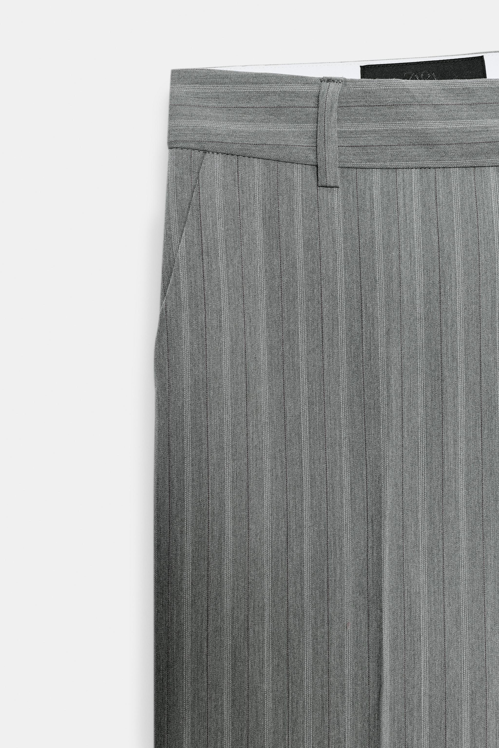 STRAIGHT-LEG LOW-RISE TROUSERS WITH CREASE